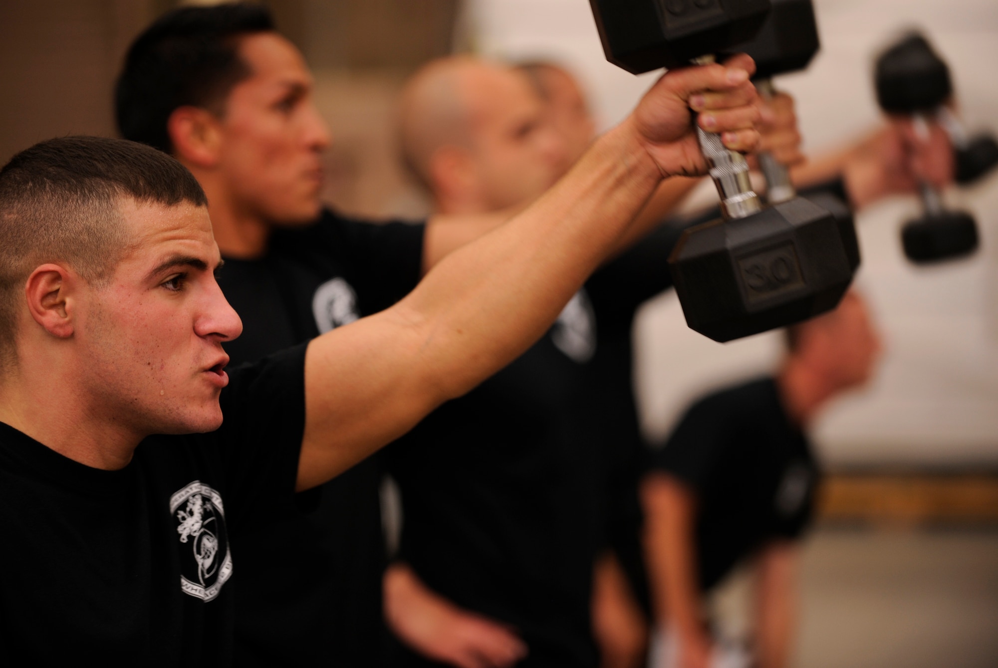 VANDENBERG AIR FORCE BASE, Calif. -- Staff Sgt. Brandon Lirio, a 614th Air and Space Operations Center member, and his joint teammates train for the Tough Mudder competition in Snow Valley here Monday, May 16, 2011.  The joint team is comprised of Air Force, Army and Marine Corps members from the 614th AOC.  (U.S. Air Force photo/Staff Sgt. Andrew Satran) 

 