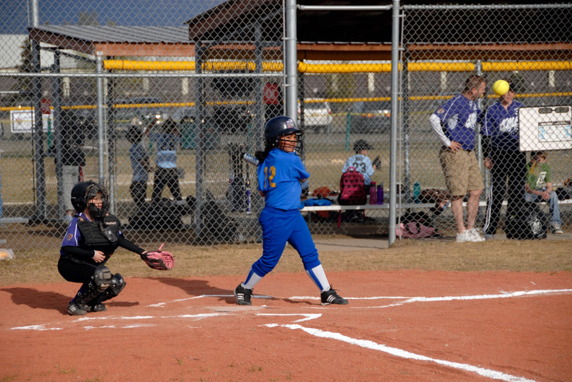 Pese Natandi takes her turn at the bat during a JBER youth softball game May 15. (U.S. Air Force photo/Steve White)
