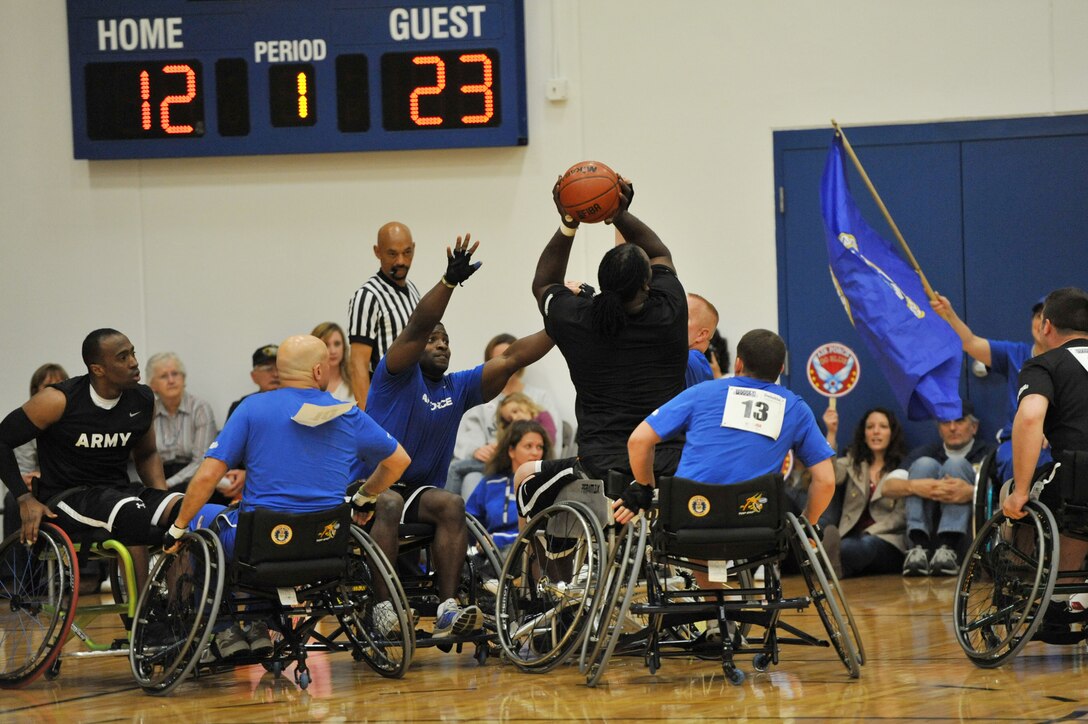 Members of the Air Force wheelchair basketball team compete May 18, 2011, during the Warrior Games at the U.S. Olympic Training Center in Colorado Springs, Colo. Some 200 wounded warriors and disabled veterans from all of the military services competed in paralympic-style athletic events May 16 to 21. (U.S. Air Force photo/Staff Sgt. Desiree N. Palacios)