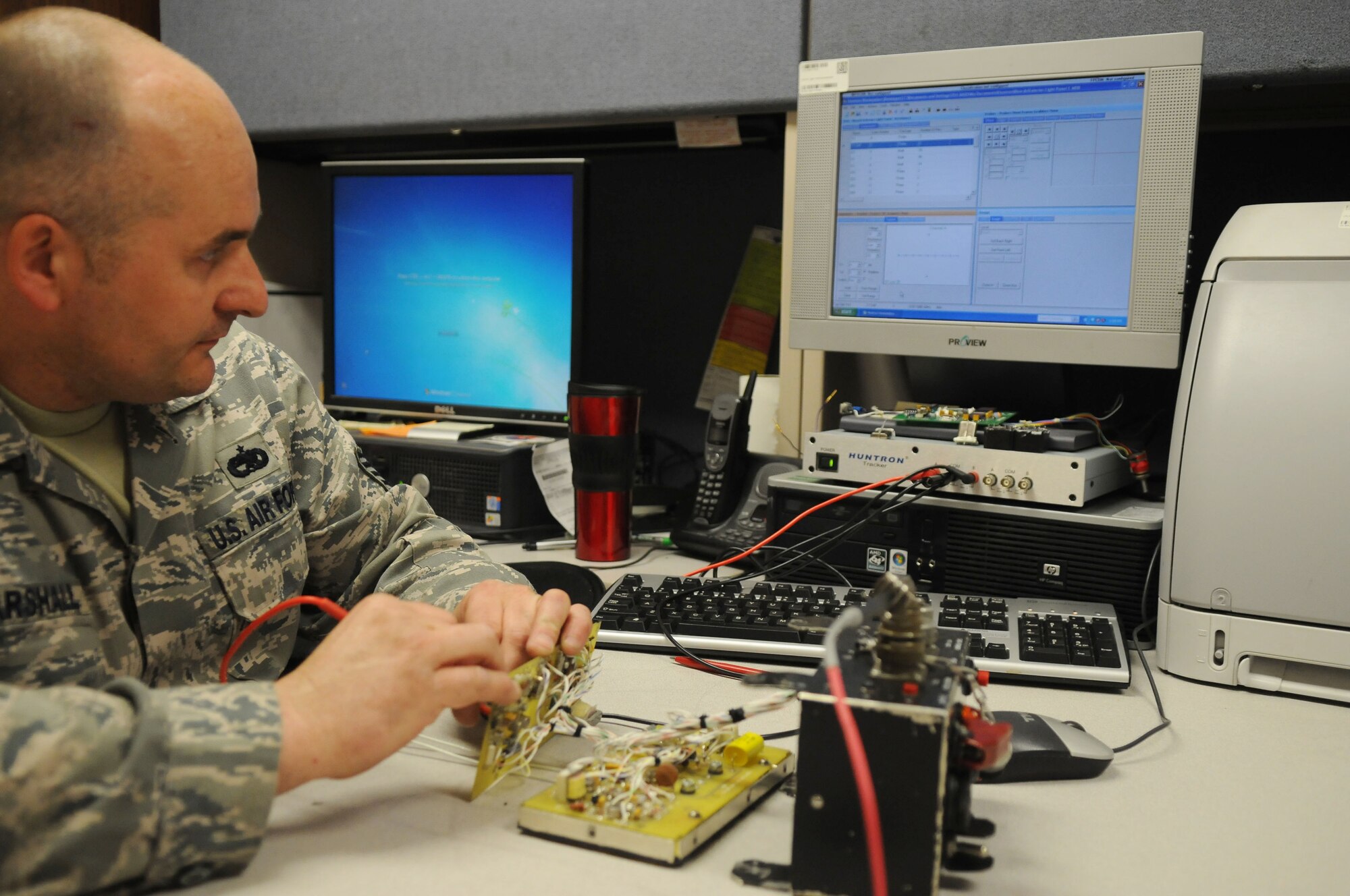 Tech. Sgt. Kevin Marshall verifies a circuit using the Huntron tracker which ensures equipment is in working order May 12, 2011, Eielson Air Force Base, Alaska. Sergeant Marshall is the Air Force repair enhancement program manager assigned to the 354 AMXS. (U.S. Air Force photo/A1C Janine Thibault)