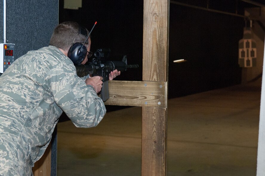 HANSCOM AIR FORCE BASE, Mass. – Lt. Gen. Ted Bowlds, Electronic Systems Center commander, takes a shot at the target during the executive rifle match, hosted by the 66th Security Forces Squadron Combat Arms Training, May 13. The 66th Security Forces Squadron hosted many demonstrations, events and activities for Police Week May 9 through 13. Money raised during the week was given to the Air Force Security Police Association and the Domestic Violence Services Network. (U.S. Air Force photo by Rick Berry)
