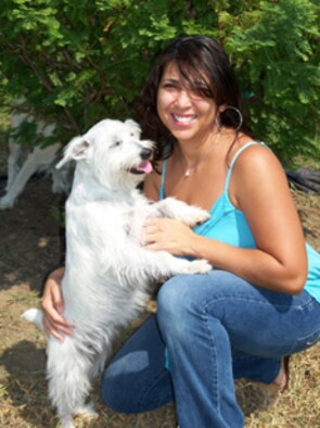 Bonnie Then, wife of Master Sgt. Ommar Then with the 512th Airlift Wing at Dover Air Force Base, Del., released her first book "Familiar Origins" in April. It's the first published novel for Mrs. Then. The fantasy-fiction novel is about five children growing up in a magical world where dragons are supreme beings. The tale focuses on the children and their ability to confront difficult life experiences and to challenge the dragons whose goal is to take over the world. (Courtesy photo)