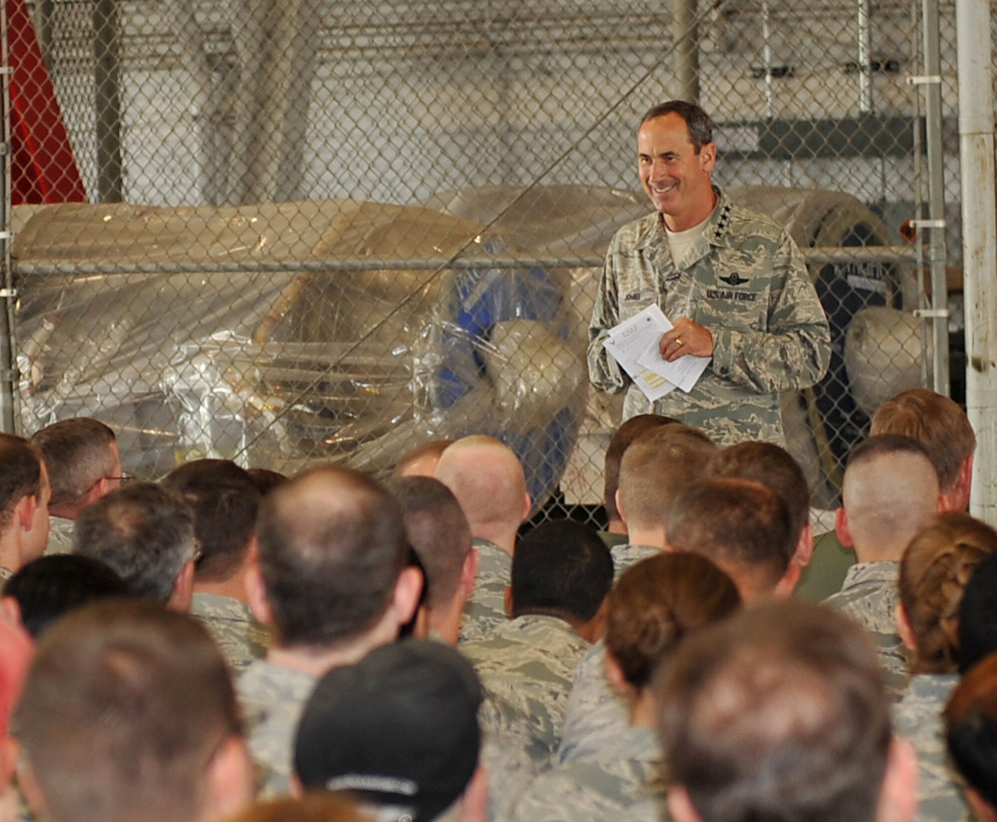Gen. Raymond Johns, Air Mobility Command commander, speaks with Team Scott during his all-call May 12, 2011 at Hangar 1 on Scott Air Force Base, Ill.  During the all-call, General Johns talked to Airmen from the 375th Air Mobility Wing about the Global Vigilance of AMC and the importance of Comprehensive Airmen Fitness in building resilient Airmen. (U.S. Air Force photo/ Airman 1st Class Divine Cox)