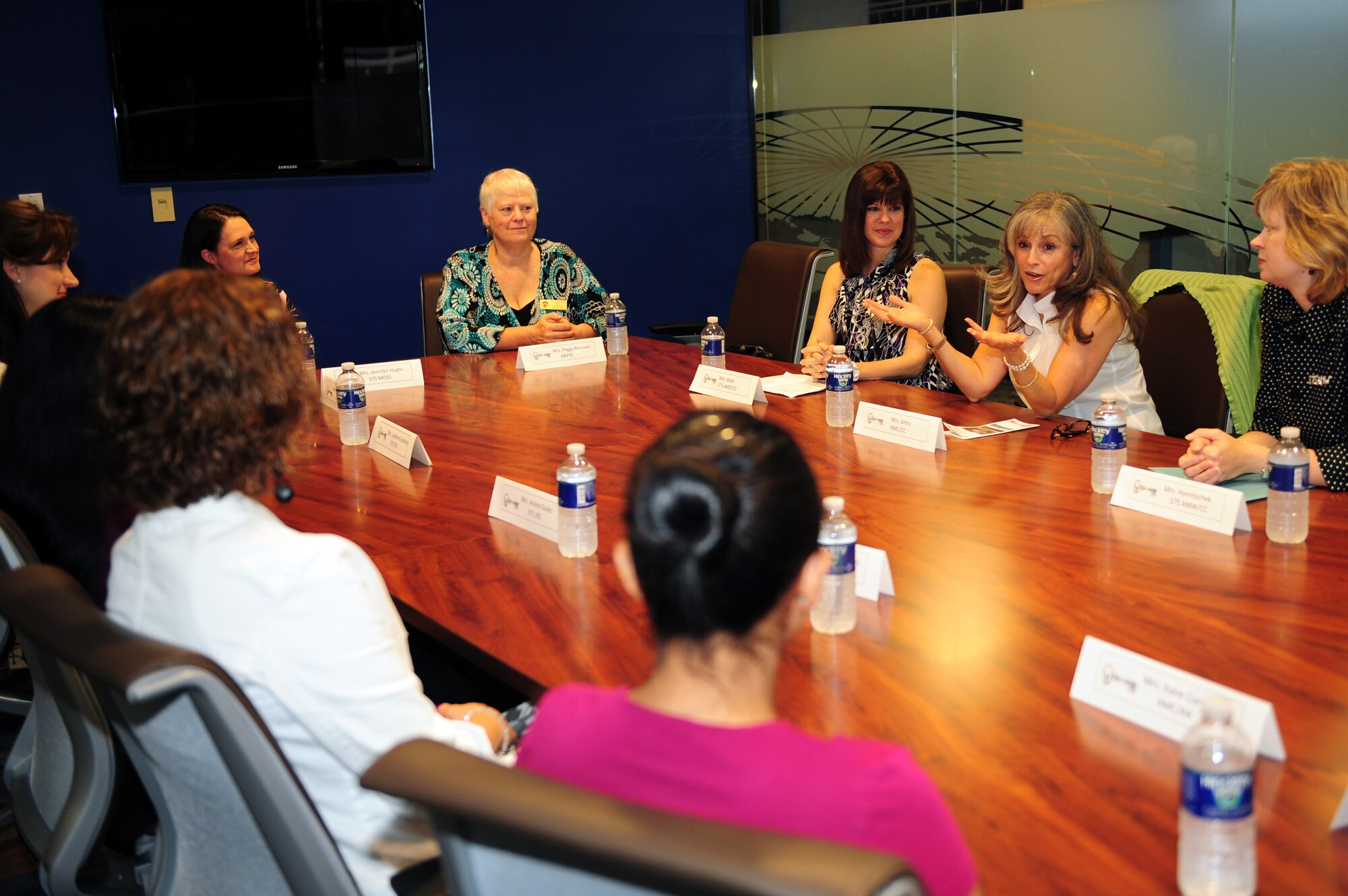 Mrs. Diana Johns, Air Mobility Command commander's wife, speaks with Scott's Key Spouses during her visit on May 12, 2011 at Scott Air Force base, Ill.  Mrs. Johns receives an "inside the support" the key spouses offer families when a spouse is deployed. (U.S. Air Force photo/ Staff Sgt. Teresa M. Jennings) 