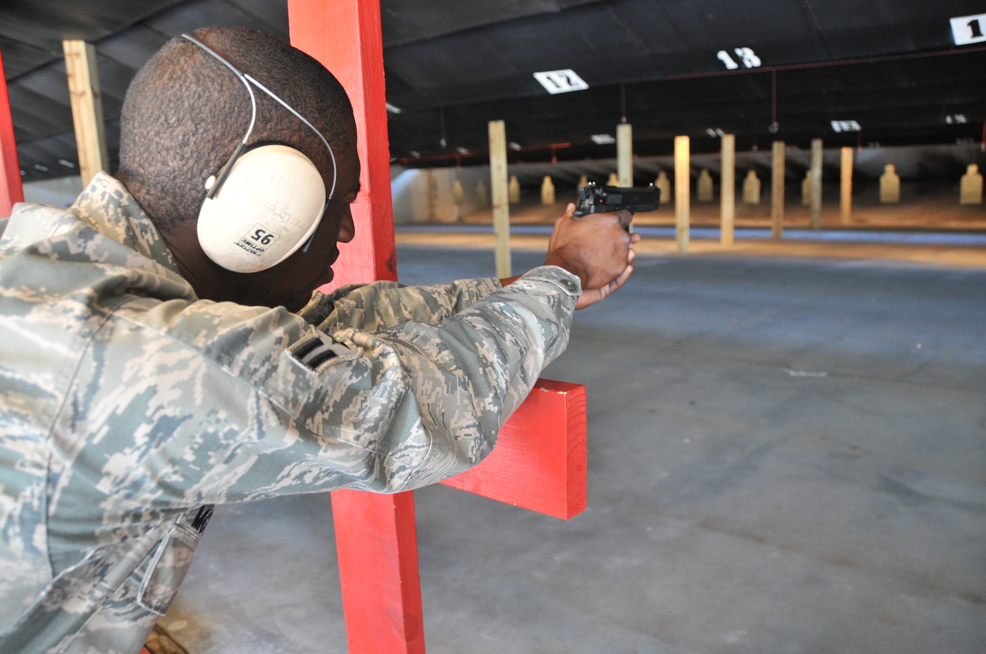 Airman 1st Class Jamel McCargo, a radio frequency transmissions system technician from the 628th Communications Squadron and a 628th Security Forces Squadron augmentee, fires his weapon at a target during an M-9 qualification training May 18, at Joint Base Charleston – Air Base. Special thanks to all of the men and women who took into account ‘service before self’ by volunteering to become an augmentee during a time of need. 