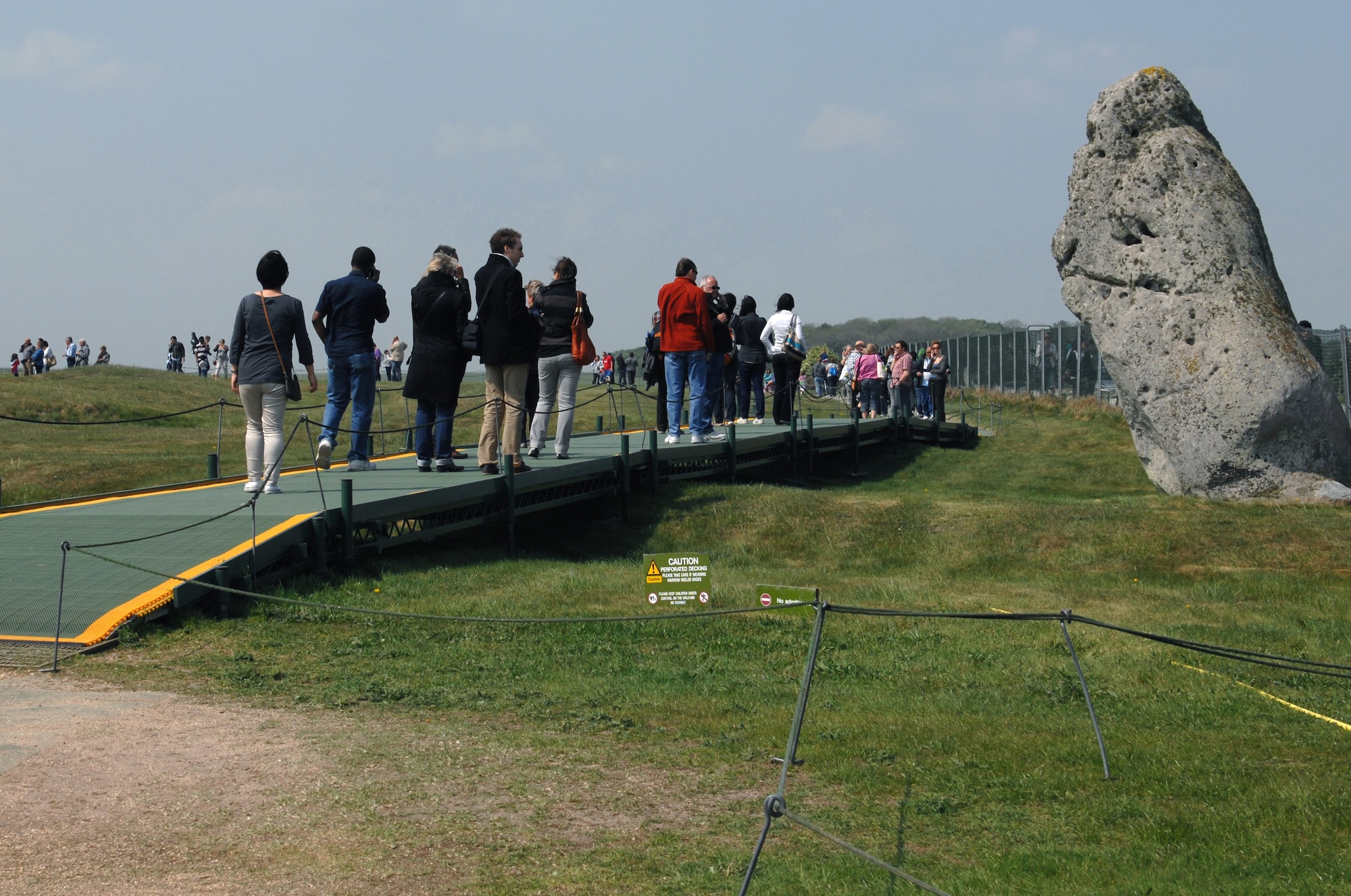 WILTSHIRE, England -- Tourists from around the globe get an up close look at the Heelstone. Constructed from blue and sarsen stones from across the UK, Stonehenge is one of the most famous archeological wonders in the world.  The RAF Lakenheath Information, Tickets and Travel office recently offered a trip to Wiltshire, England to visit the historical site.  During the free roaming tour, visitors could listen to a recording to learn in-depth information about the various stages of construction, historical uses of the site and the significance of certain stones within the circle.  The site, is believed to have been constructed between 3,000 ? 2,200 B.C.  The RAF Lakenheath ITT office offers several trips every month destinations around the UK. The next trip to Stonehenge Inner Circle Access and Windsor is scheduled for May 21, 2011. The next trip to Stonehenge and the City of Salisbury is scheduled for June 12, 2011.  (Editor's note: No federal endorsement is intended or implied concerning places of interest covered by the 48th Fighter Wing Public Affairs.)  (U.S. Air Force photo/Tech. Sgt. Lee A. Osberry Jr.)

