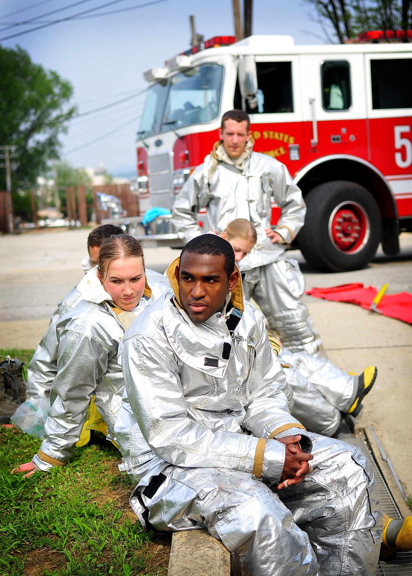 U. S. Air Force Academy Cadets wait to receive instructions during a search and rescue training exercise.  The cadets participated in field training with 51st Civil Engineer firefighters at Osan Air Base May 18. (U.S. Air Force Photo by Senior Airman Evelyn Chavez)