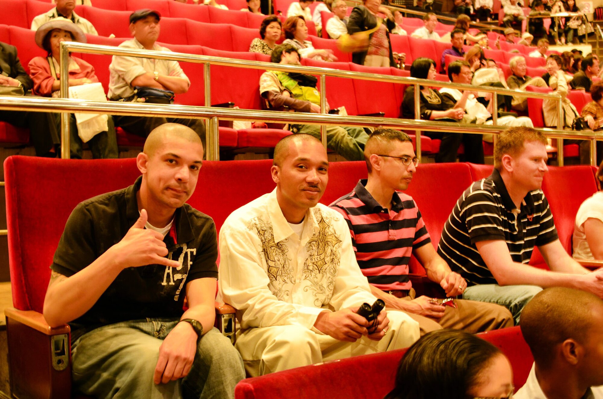 YOKOTA AIR BASE, Japan - (Left to right) Staff Sgt. Antonio Haynie, Staff Sgt. Kristoffer Bruce, Tech Sgt. Leo De Los Santos, all from the 374th Medical Support Squadron, and Tech Sgt. William Bergendahl, 374th Maintenance Squadron, enjoy a day of Sumo at the Ryogoku Kokugikan, Tokyo, Japan, May 14, 2011. More than 150 members of the team Yokota family were invited to witness Japanese culture first hand. (Courtesy Photo)