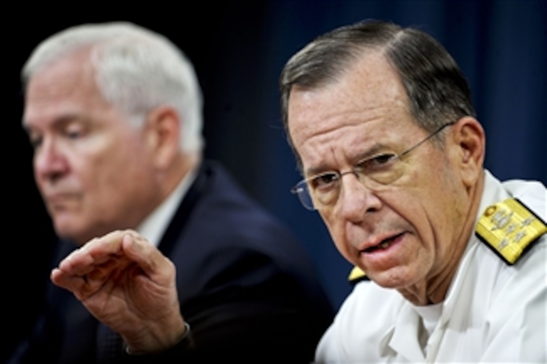 Chairman of the Joint Chiefs of Staff Adm. Mike Mullen, U.S. Navy, responds to a question during a press conference with Secretary of Defense Robert M. Gates in the Pentagon on May 18, 2011.  
