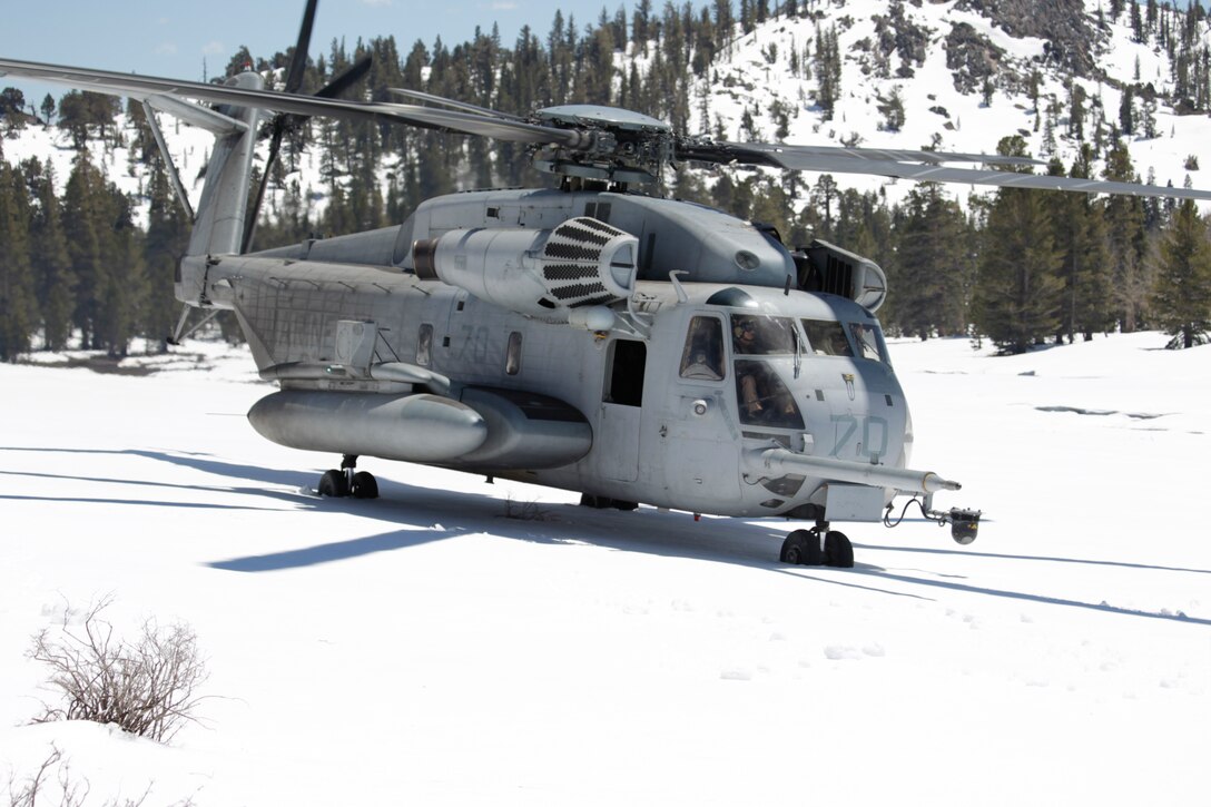 A CH-53E Super Stallion crew from Marine Heavy Helicopter Squadron 361 test their aircraft on snowy terrain at Marine Corps Mountain Warfare Training Center Bridgeport, Calif., May 20, 2011. For many of the Marines, this was the first time they landed in snow.