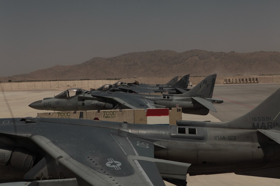 AV-8B Harriers with Marine Attack Squadron 513, deployed out of Marine Corps Air Station Yuma, Ariz., rest at Kandahar Airfield, Afghanistan, following their arrival, May 20. VMA-513, which was the first Marine Corps Harrier squadron to deploy to Afghanistan, recently returned after more than a decade. “There is nothing impossible for the Marines of the squadron,” said Sgt. Maj. Scott E. Cooper, the VMA-513 squadron sergeant major, and native of Huntington Beach, Calif. “Their hearts are in the right places, they are focused on their missions and they want to be here.”