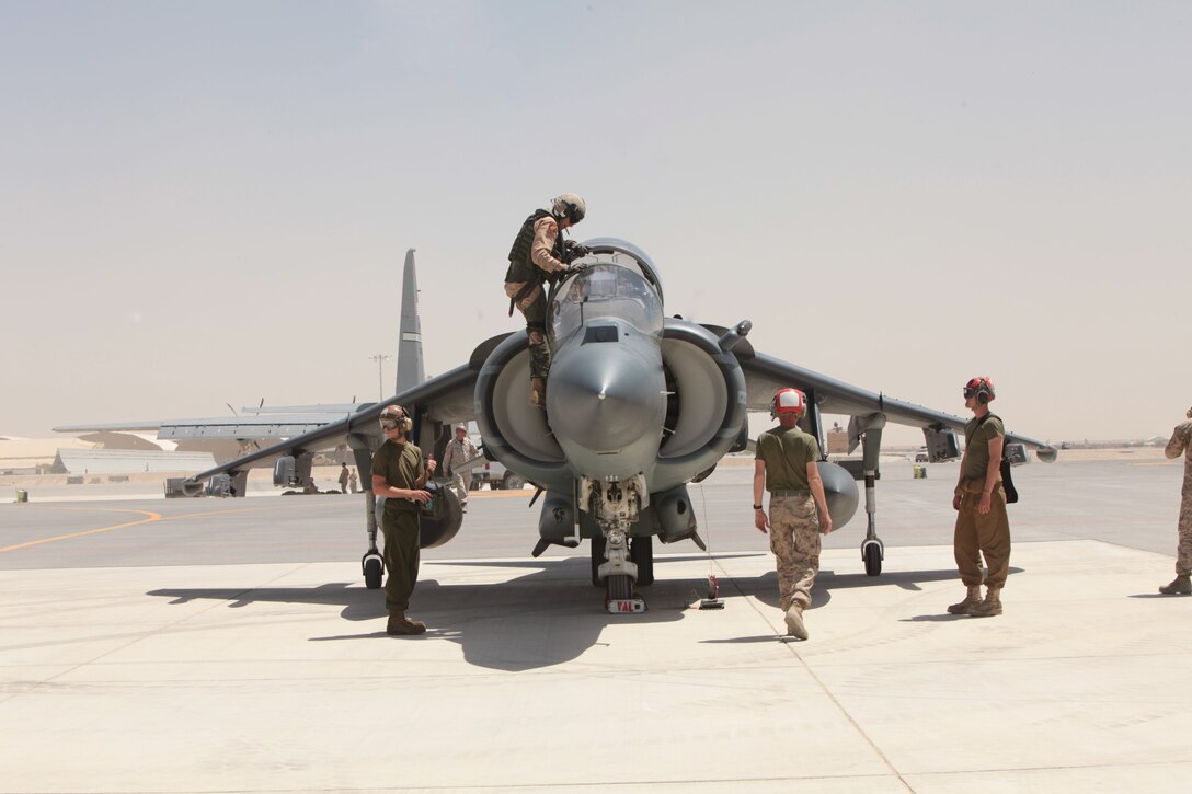 AV-8B Harriers with Marine Attack Squadron 513, deployed out of Marine Corps Air Station Yuma, Ariz., rest at Kandahar Airfield, Afghanistan, following their arrival, May 20. VMA-513, which was the first Marine Corps Harrier squadron to deploy to Afghanistan, recently returned after more than a decade. "There is nothing impossible for the Marines of the squadron," said Sgt. Maj. Scott E. Cooper, the VMA-513 squadron sergeant major, and native of Huntington Beach, Calif. "Their hearts are in the right places, they are focused on their missions and they want to be here." U.S. Marine Corps photo by Pfc. Sean T. Dennison