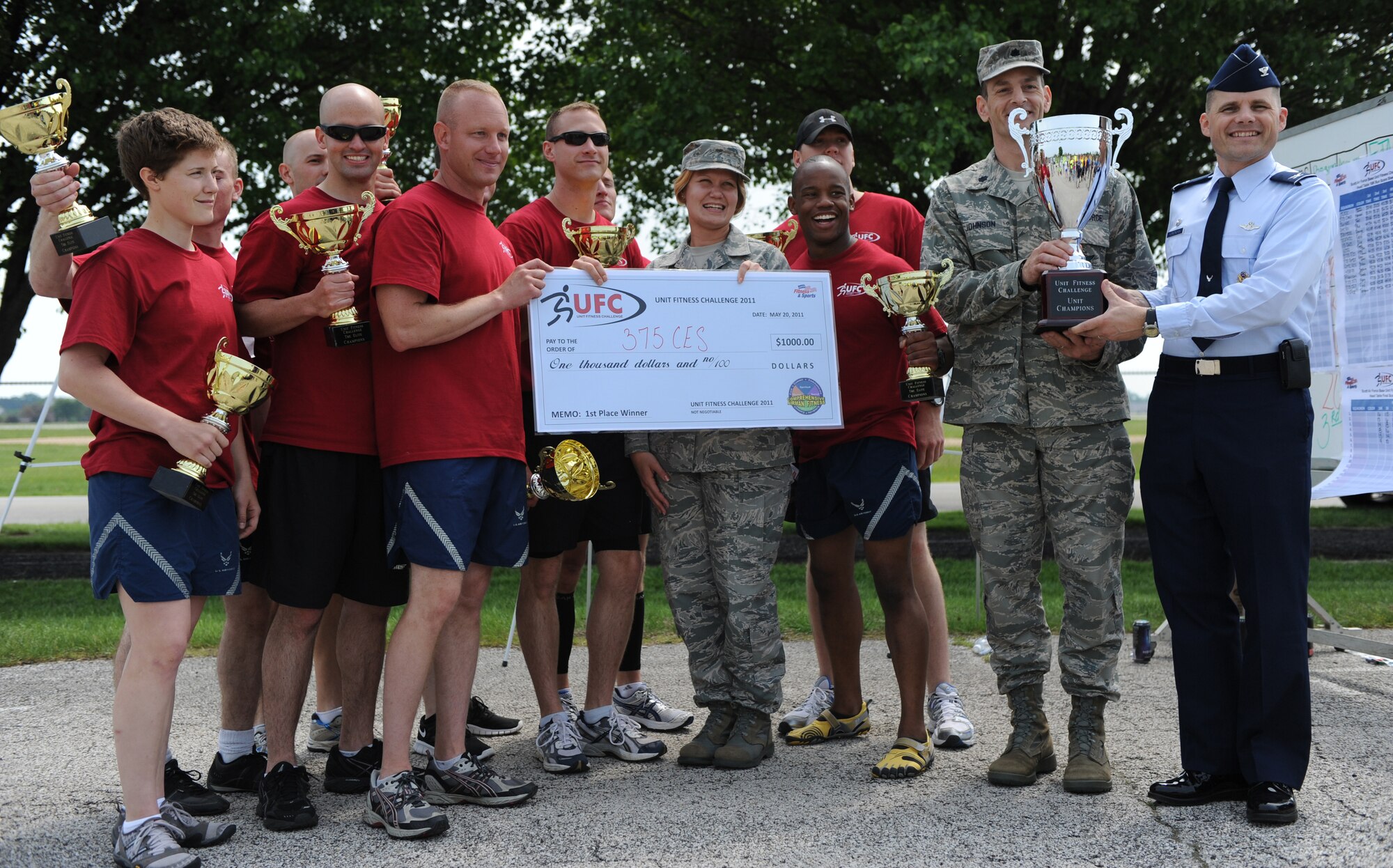 The 375th Civil Engineer Squadron took first place in the Scott Air Force Base Fitness Challenge 2011 out of sixteen teams. Points were awarded to each team for their best times in a 5K run, a 10K run, a 600 push-ups and sit-ups challenge and a 25 pull-ups challenge. (U.S. Air Force photo/ Airman 1st Class Jacob Eckhardt)

