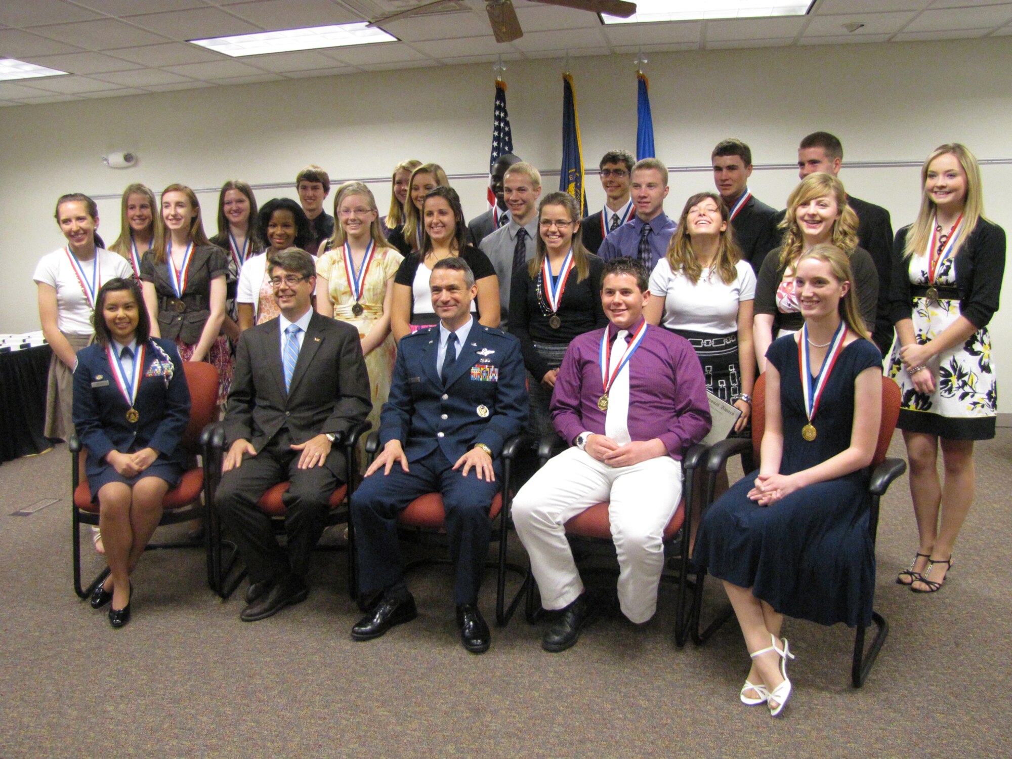 OFFUTT AFB, Neb. – Representative Lee Terry and 55th Wing commander Brig. Gen. Donald J. Bacon presented congressional awards to local youth during a ceremony May 17 at the Bellevue Public Schools Welcome Center.. Contestants are awarded based on points earned in four areas: volunteer public service, personal development, physical fitness and expedition/exploration activities.