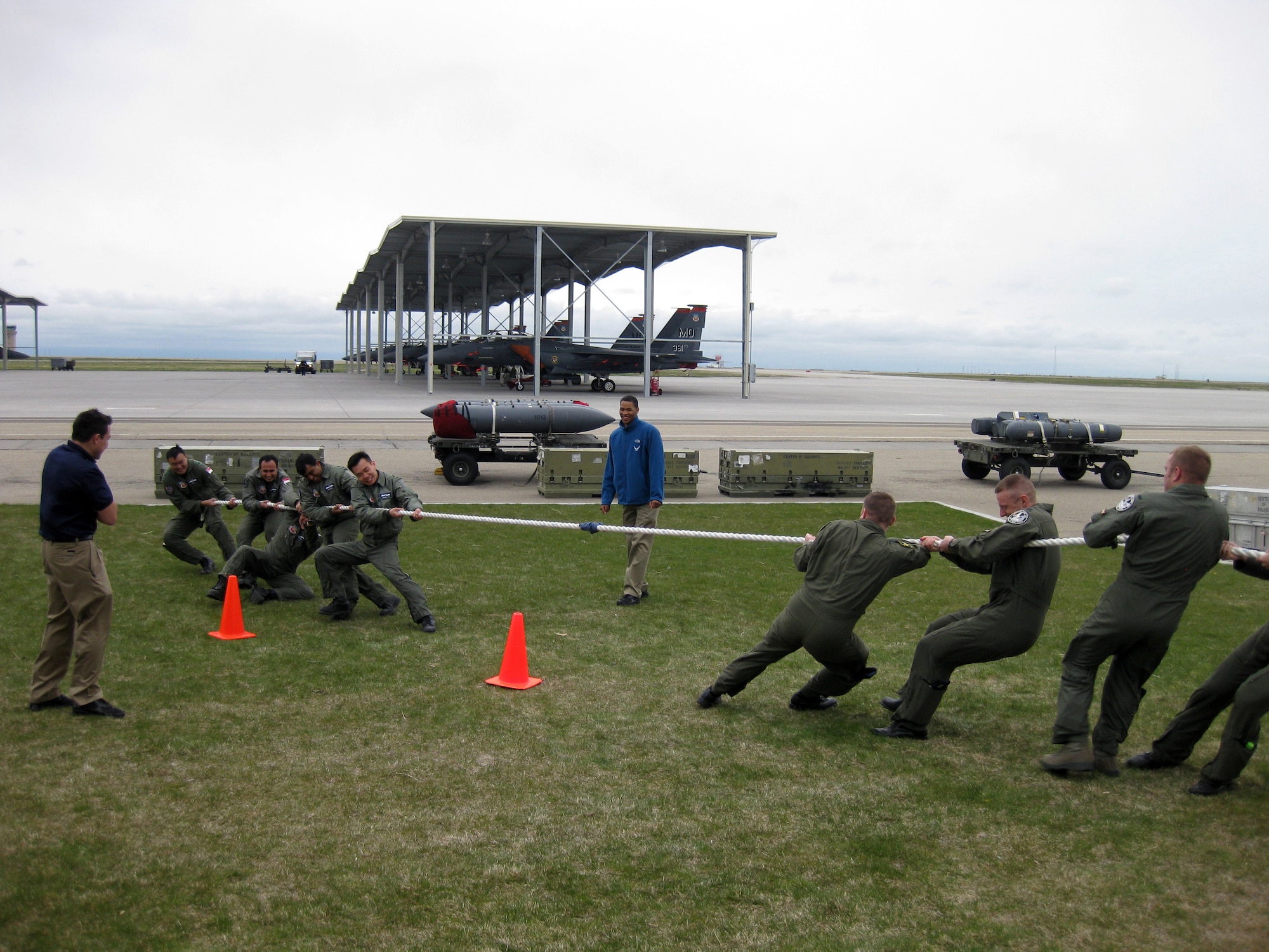 MOUNTAIN HOME AIR FORCE BASE, Idaho -- U.S. and Republic of Singapore operation personnel compete against each other in a friendly tug-of-war May 13 at the 391st Fighter Squadron. Maintenance and MHAFB fire department personnel also competed. (Courtesy photo) 