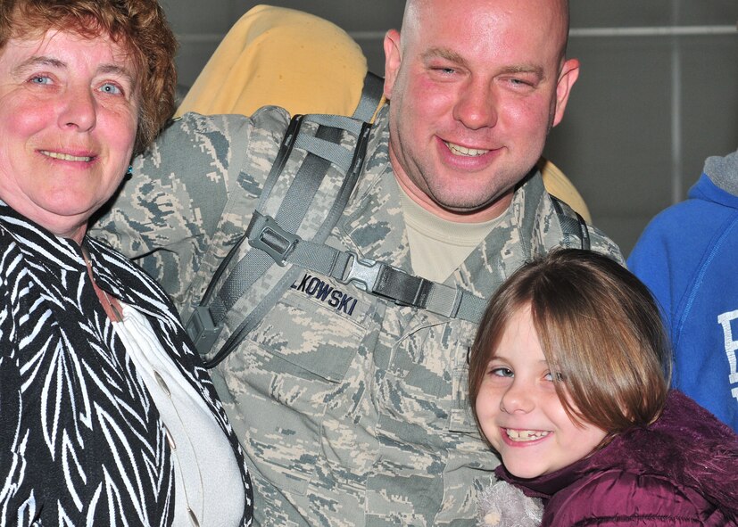 Airmen from 914th and 107 Airlift Wings are welcomed home by friends and family, May 16, 2011, Niagara Falls Air Reserve Station, NY.  The airmen return from a deployment to an undisclosed location in southwest Asia. (U.S. Air Force photo by Staff Sgt. Joseph McKee)
