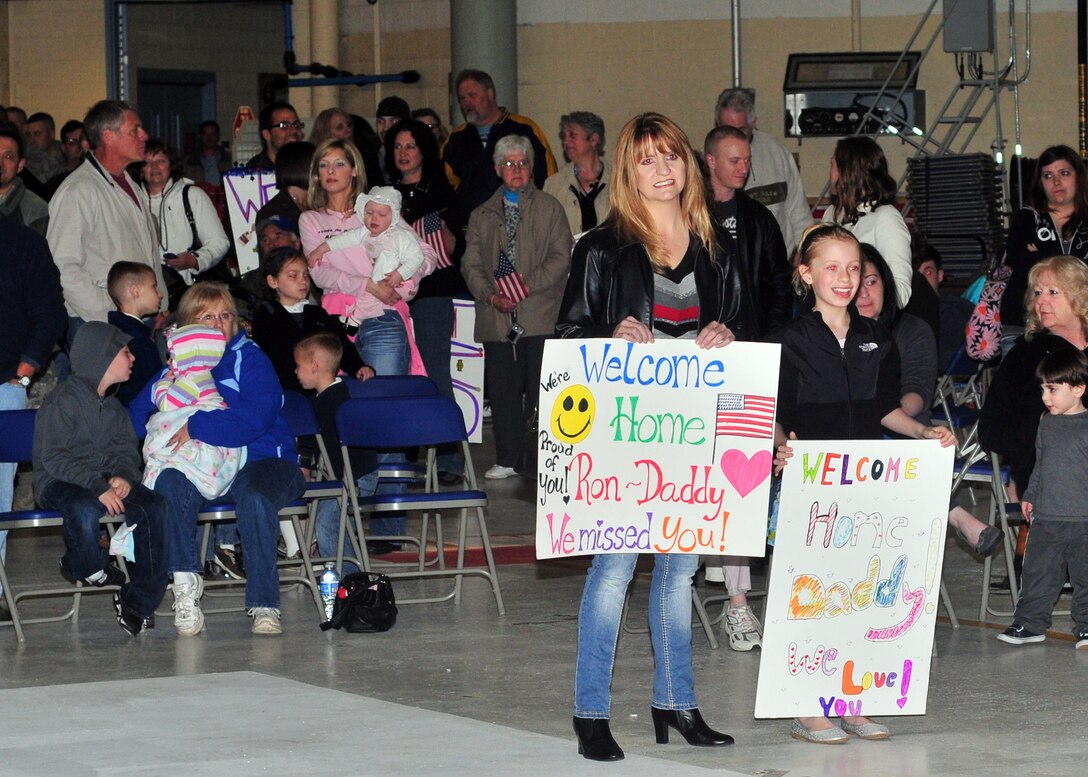 Airmen from 914th and 107 Airlift Wings are welcomed home by friends and family, May 16, 2011, Niagara Falls Air Reserve Station, NY. Airmen from 914th and 107 Airlift Wings return from a deployment to an undisclosed location in southwest Asia. (U.S. Air Force photo by Staff Sgt. Joseph McKee)