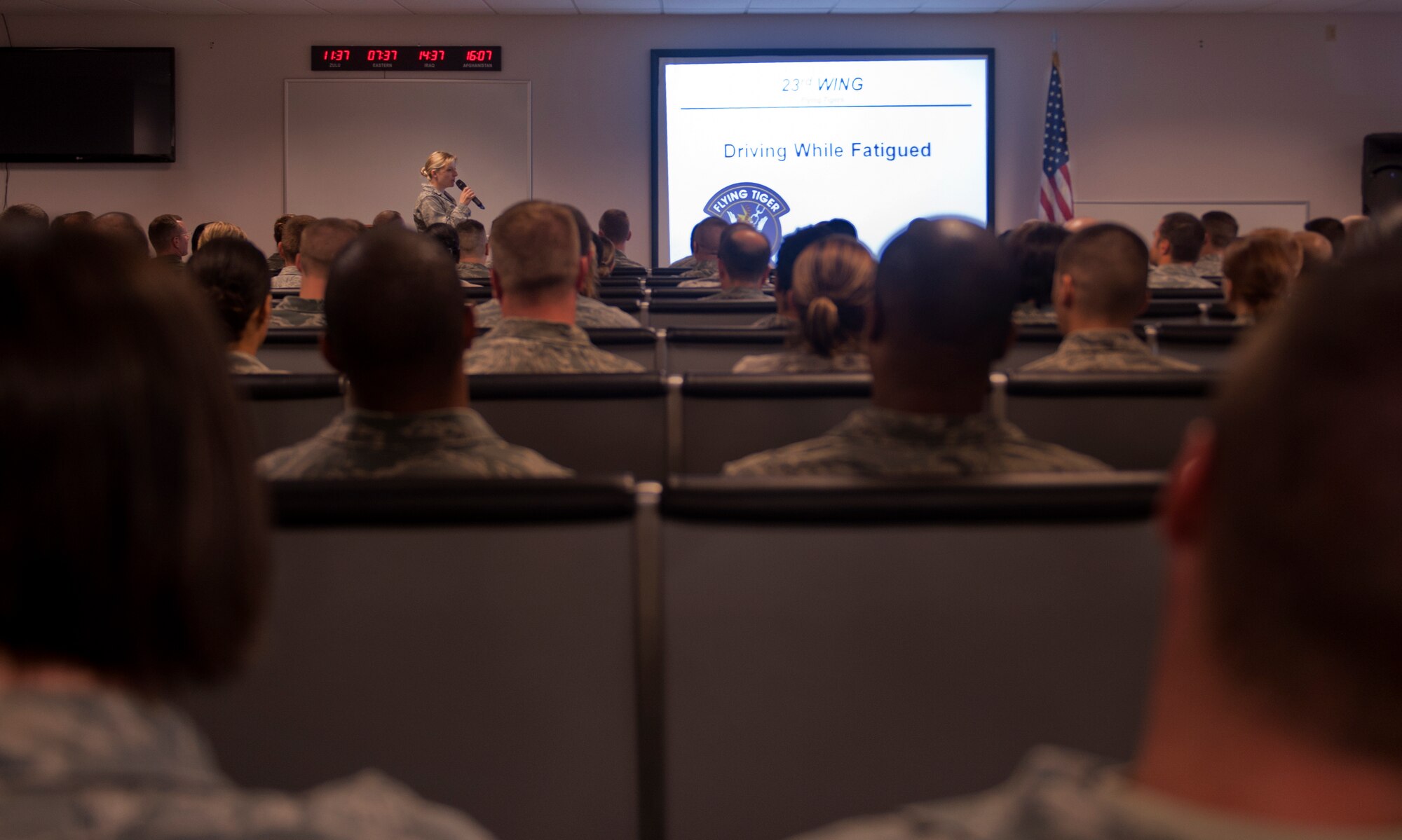 Airmen listen to a safety briefing to kick off the  Critical Days of Summer at Moody Air Force Base, Ga., May 20. The many topics included motorcycle safety and driving while sleep- deprived. (U.S Air Force photo/Airman 1st Class Douglas Ellis)(RELEASED)
