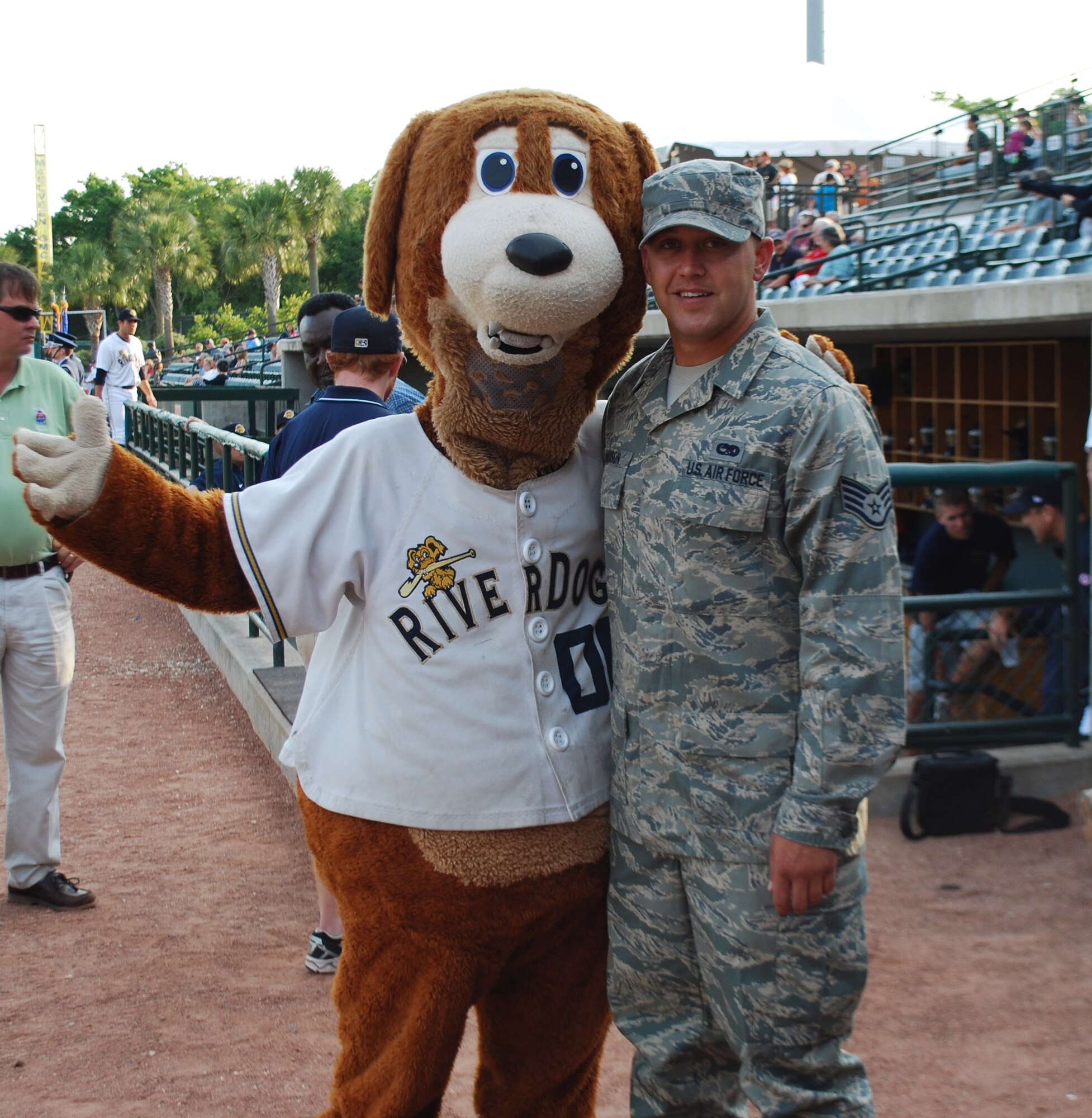Staff Sergeant Andrew Maxon, a reservist with the 315th Maintenance Squadron who is posing with Charlie the Riverdog, was selected to throw out one of the ceremonial first pitches.  He was selected because of his accomplishments during a recent deployment.

Members of the 315th Airlift Wing along with representatives from the entire Charleston military community participated in the Riverdog's military appreciation night at Joe Riley Stadium on May 19, 2001. (U.S. Air Force Photo/Capt. Wayne Capps)