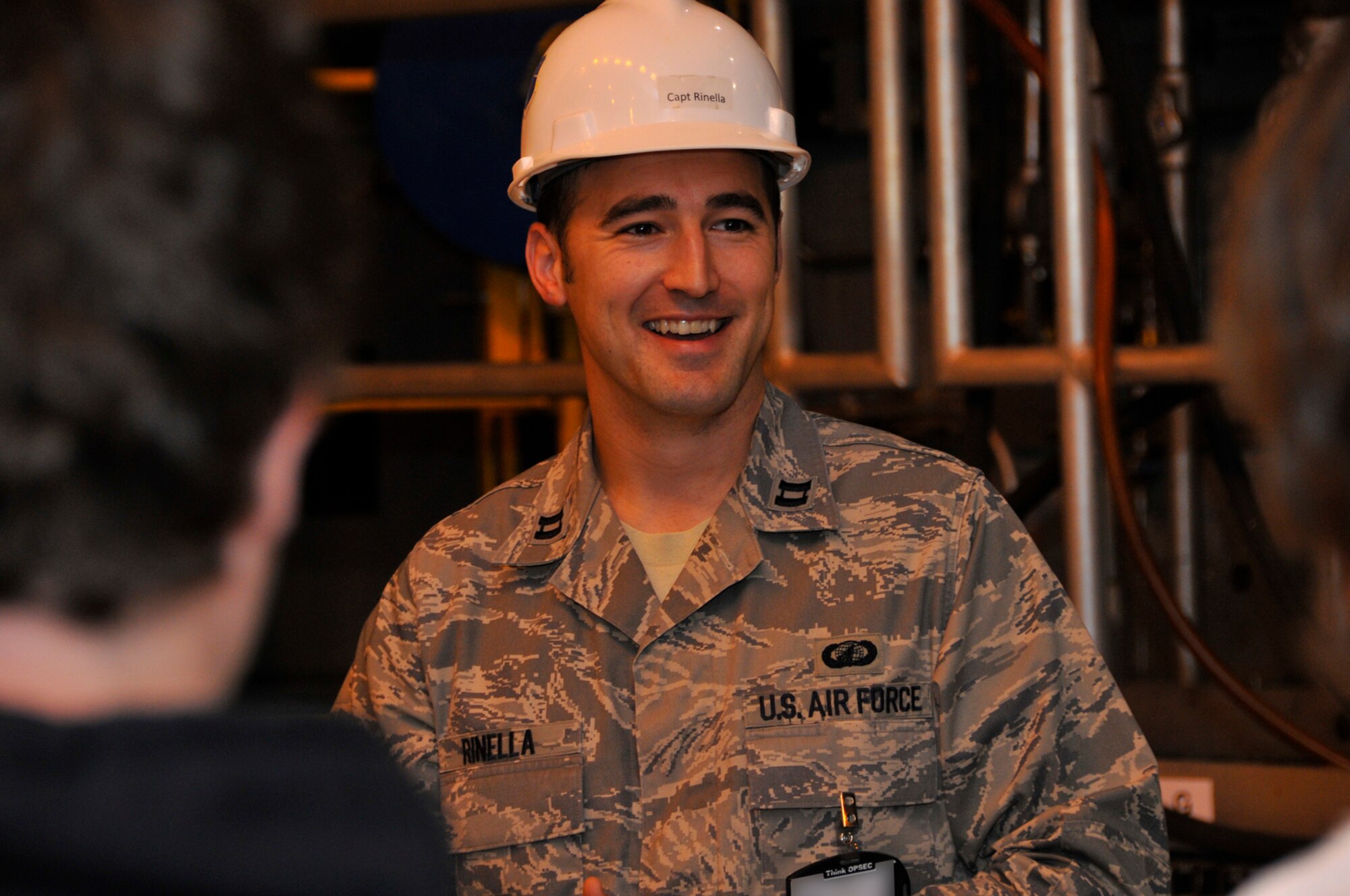 Capt. Scott Rinella talks with Fairview High School students during a tour of AEDC’s SL-2 test cell April 13. Captain Rinella, who recently won a prestigious AFMC award, will leave Arnold AFB for test pilot school in June. (Photo by Rick Goodfriend)