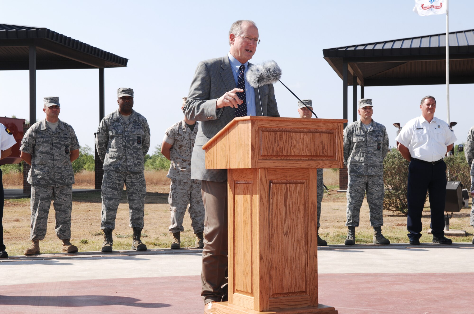 GOODFELLOW AIR FORCE BASE, Texas -- Congressman Mike Conaway, 11th District of Texas, speaks at the firefighter award ceremony May 18. Fifty-four Team GoodFellow firefighters received achievement medals for their assistance in extinguishing the Texas Wildcat Fire. (U.S. Air Force photo/Staff Sgt. Laura R. McFarlane)