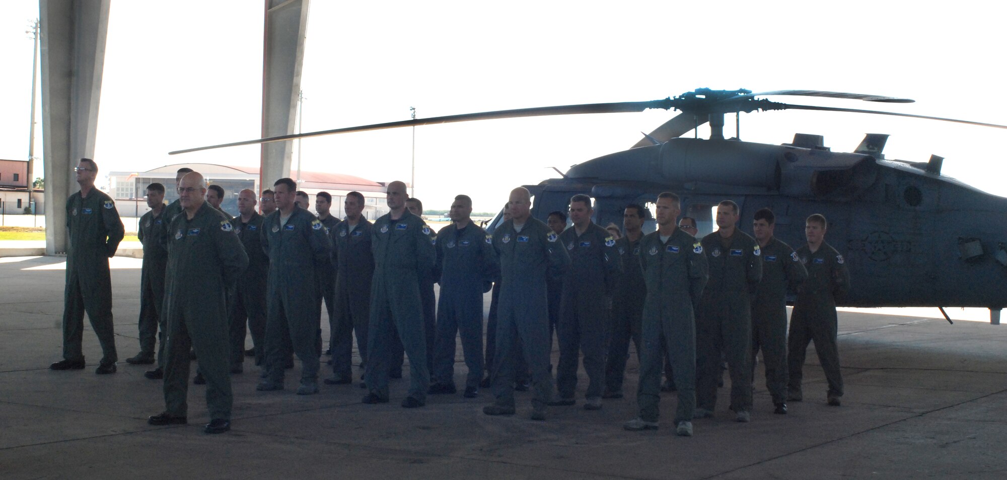 PATRICK AIR FORCE BASE, Fla. - The U.S. Air Force Reserve Airmen of the 301st Rescue Squadron here, stand in formation during the change of command ceremony, May 19, where Lt. Col. Joseph Alcorn assumes command. The 301st RQW is a helicopter squadron which falls under the 920th Rescue Wing - a combat search and rescue unit dedicated to rescuing service members off the battlefield during combat using the HH-60G Pave Hawk helicopter. The Rescue Airmen are also responsible for saving civilians in distress and providing rescue support for the NASA shuttle launches. (U.S. Air Force photo/Staff Sgt. Leslie Forshaw)