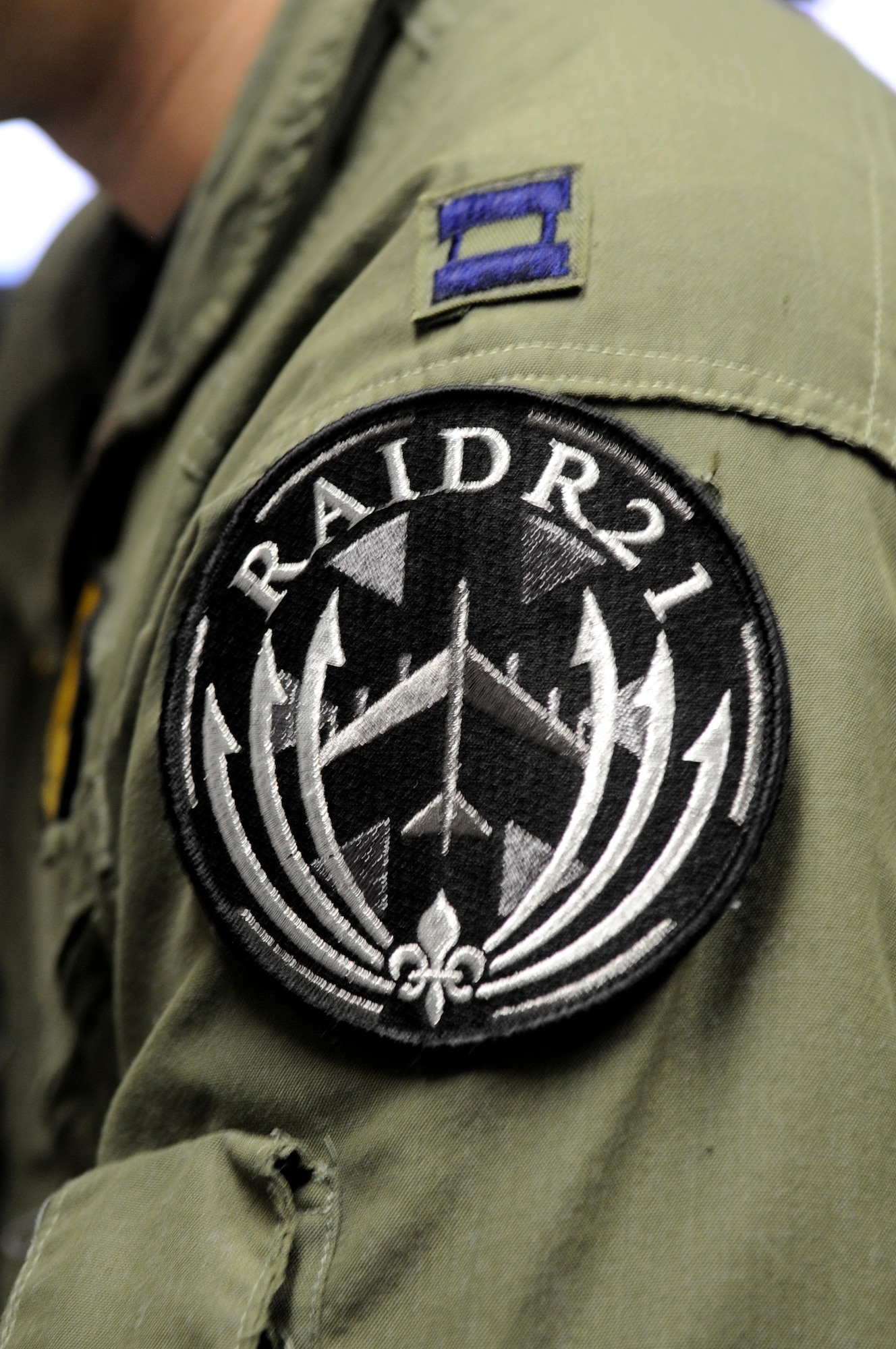 Aircrew from the bomber community sometimes wear a RAIDR 21 patch to honor and remember their fallen brothers on Fridays. RAIDR 21 was the call sign of a B-52H from Barksdale Air Force Base, La., which crashed off the coast of Guam July 21, 2008, killing the six aircrew. (U.S. Air Force photo/Staff Sgt. John Gordinier)(RELEASED)