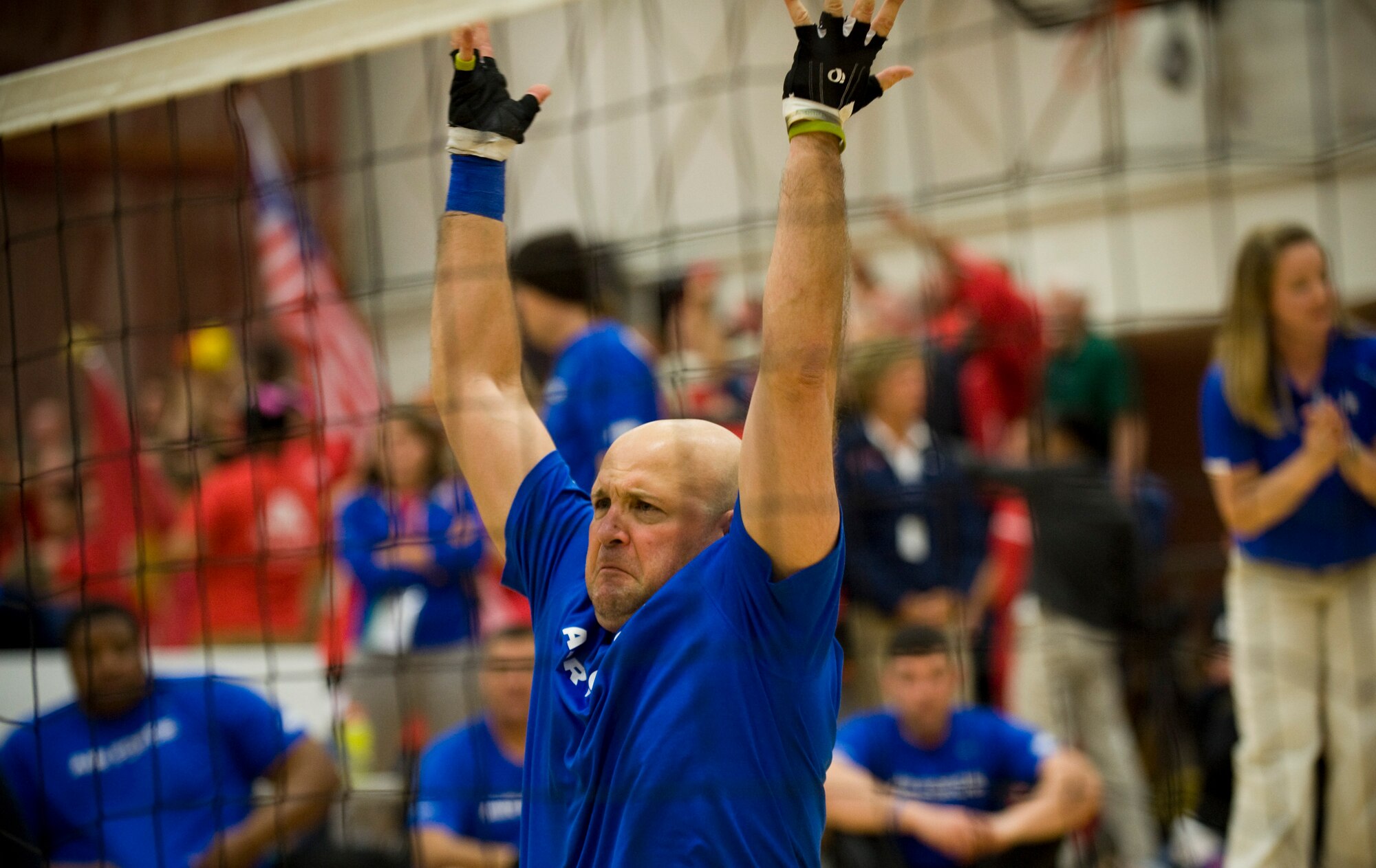 Chief Master Sgt. Damian Orslene hypes up the crowd during a close match against the Army May 19, 2011, during the the second annual Warrior Games in Colorado Springs, Colo. The Army won the series with two straight games. (U.S. Air Force photo/Staff Sgt. Christopher Griffin)
