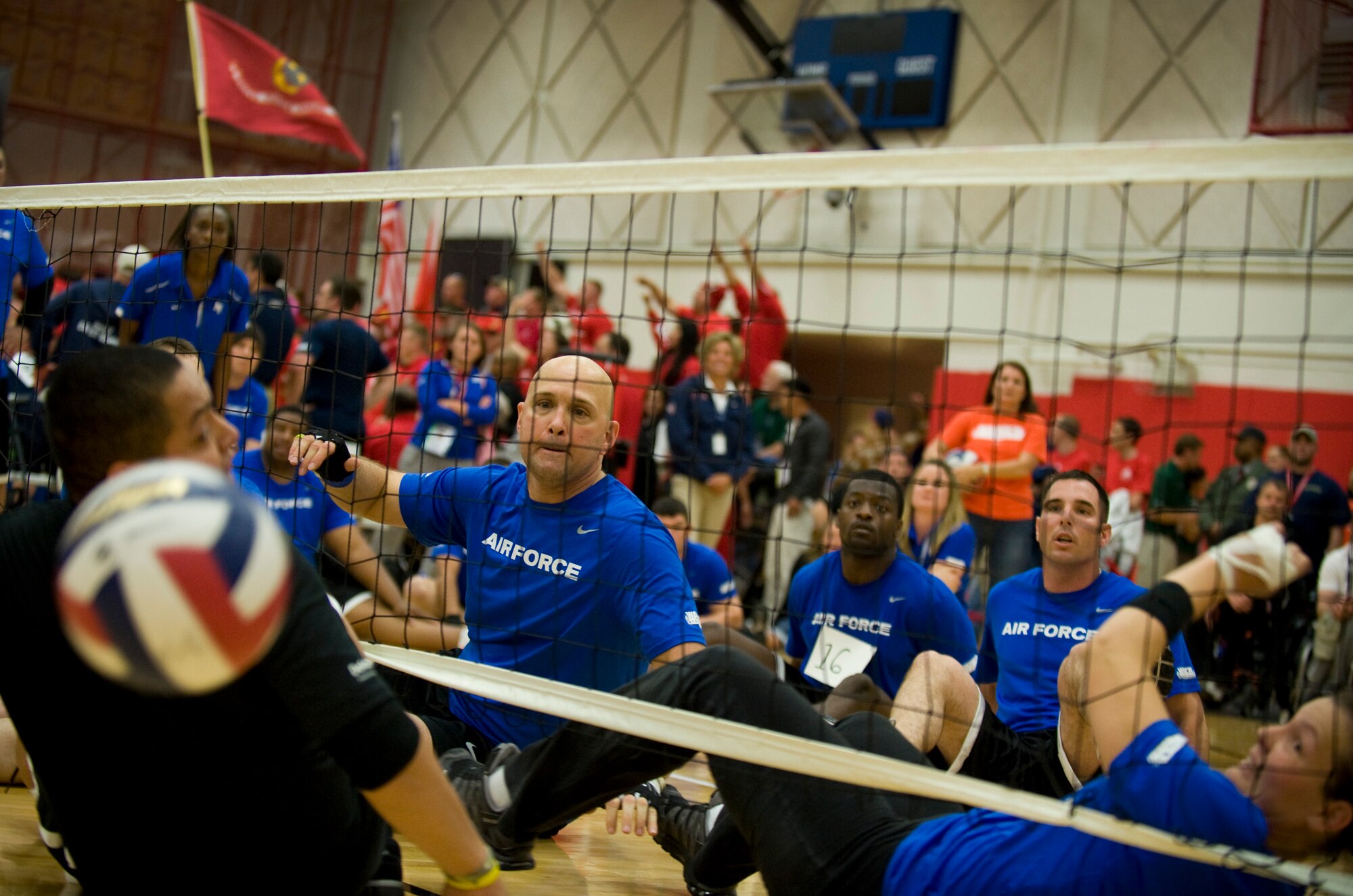 Members of the Air Force sitting volleyball team watch as they score a point against the Army May 19, 2011, during the the second annual Warrior Games in Colorado Springs, Colo. The Army won the series with two straight games. (U.S. Air Force photo/Staff Sgt. Christopher Griffin)