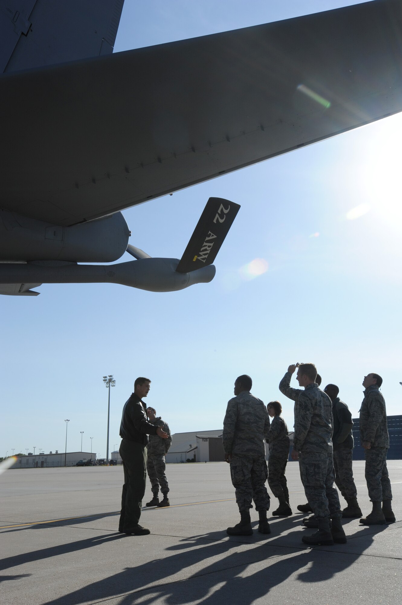 Master Sgt. Jason Hall, 22nd Operations Group boom operator, gives first-term Airmen a brief tour of the KC-135 Stratotanker May 17, 2011, McConnell Air Force Base, Kan. The 21 first-term Airmen were given the opportunity to take the incentive flight to better understand the primary mission of the KC-135. (U.S. Air Force photo/Airman 1st Class Laura L. Valentine)