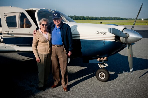 VALDOSTA, Ga.-- Retired Air Force Col. Clarence Parker and his wife, Dorothy Lee, stand in front of an aircraft as Colonel Parker prepares to take flight one last time at the Valdosta Regional Airport on May 20. Clarence and Dorothy Lee met in elementary school and now have been married for sixty-nine years. (U.S. Air Force photo/Airman 1st Class Benjamin Wiseman)(RELEASED)
