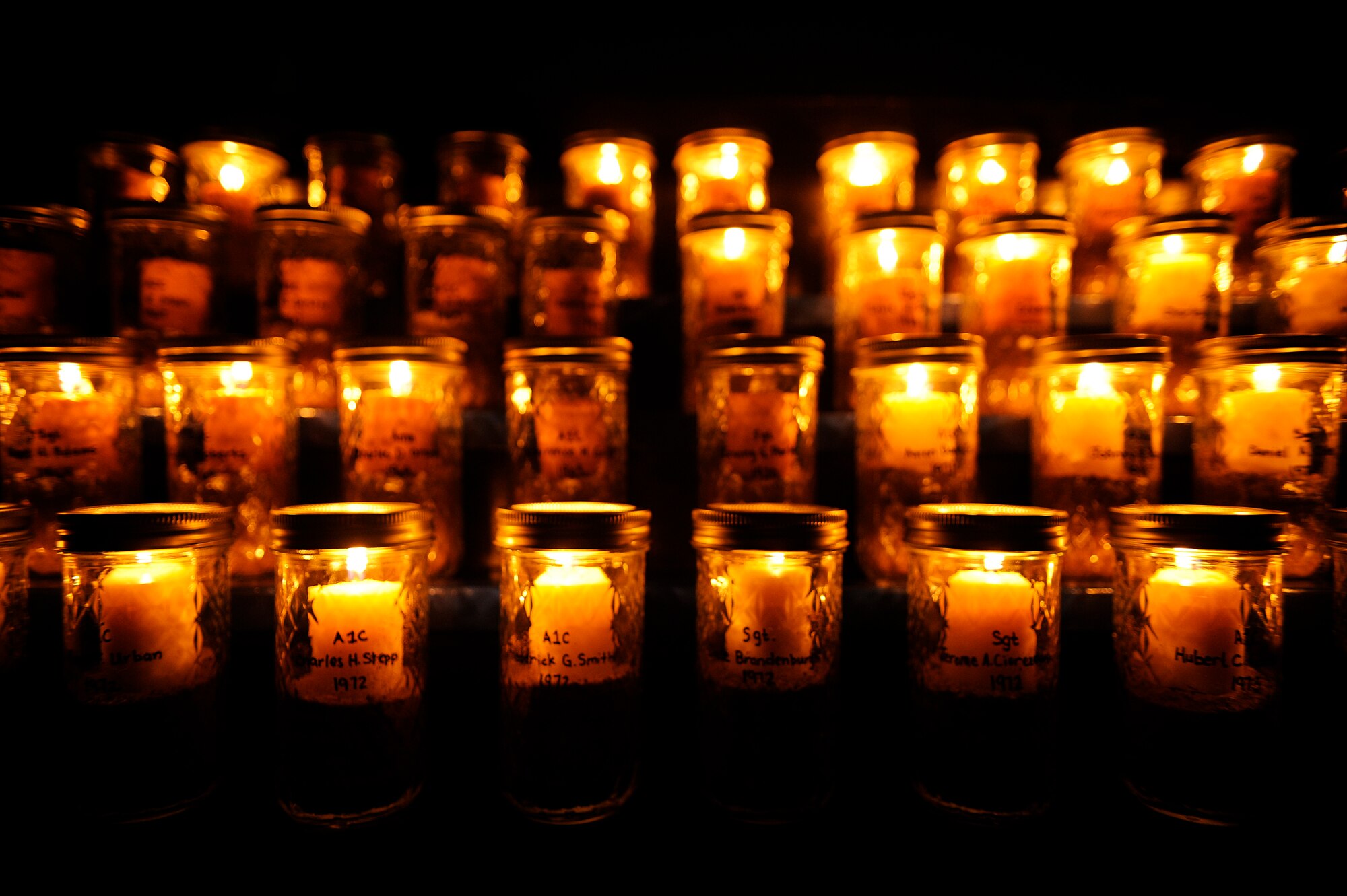 VANDENBERG AIR FORCE BASE, Calif. -- Candles glow in the night for fallen police officers and security forces members during the Candlelight Vigil Ceremony at Missile V here Thursday, May 19, 2011. (U.S. Air Force photo/Staff Sgt. Andrew Satran) 

 
  