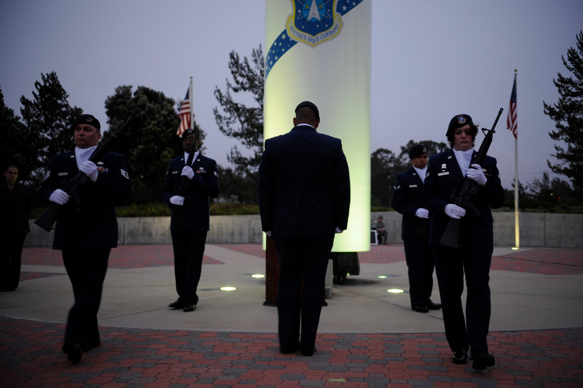 VANDENBERG AIR FORCE BASE, Calif. -- Members of the 30th Security Forces Squadron perform a changing of the guard during the Candlelight Vigil Ceremony at Missile V here Thursday, May 19, 2011.  The ceremony was held in honor of fallen policemen during National Police Week. (U.S. Air Force photo/Staff Sgt. Andrew Satran) 

 