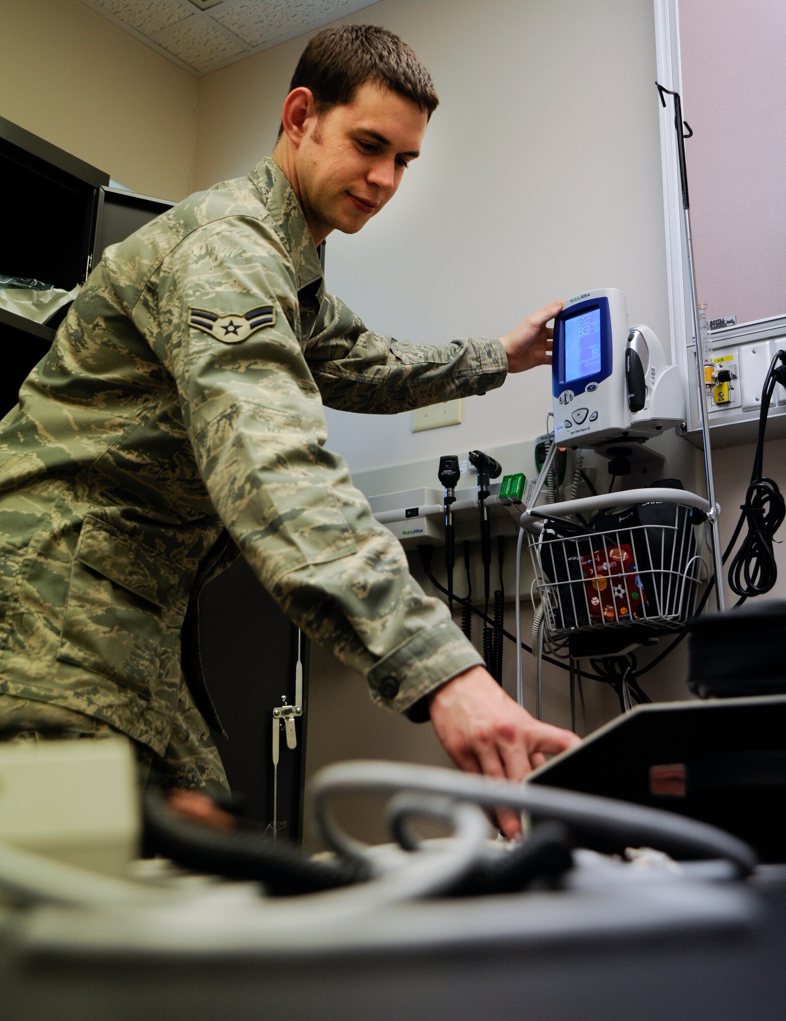 Airman 1st Class Lawrence Seay, 22nd Medical Support Squadron biomedical equipment technician, calibrates a blood pressure monitor May 13, 2011, McConnell Air Force Base, Kan.  National Biomedical/ Clinical Engineering Appreciation Week starts May 22 to showcase the work BMETs do for medical centers across the country.