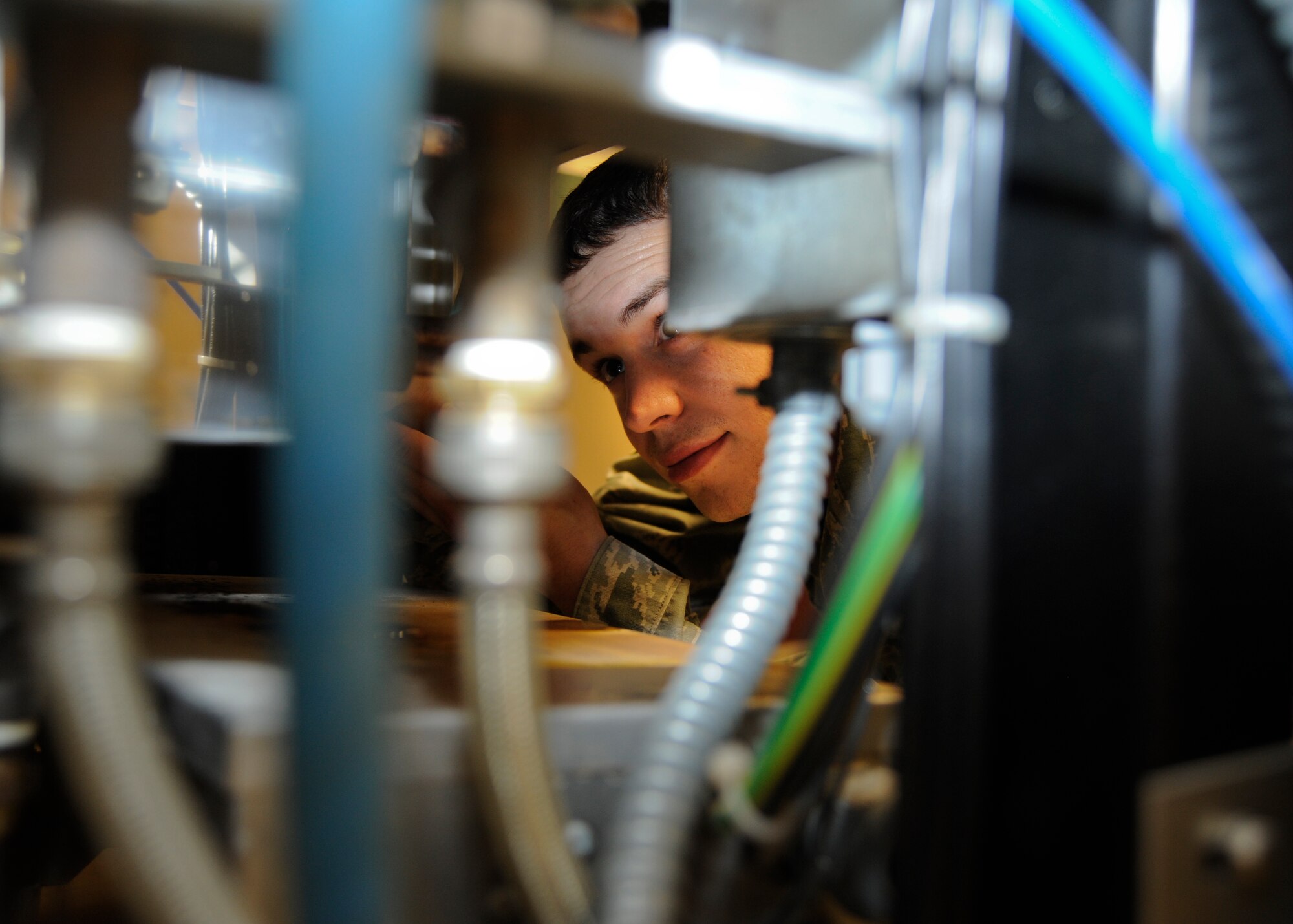 Working inside of a sterilizer, Airman 1st Class Lawrence Seay, 22nd Medical Support Squadron biomedical equipment technician, ensures the medical mission continues May 13, 2011, McConnell Air Force Base, Kan.  During May, BMETs across the country are recognized for their work in medical facilities with a weeklong celebration. (U.S. Air Force photo/Airman 1st Class Armando A. Schwier-Morales)    