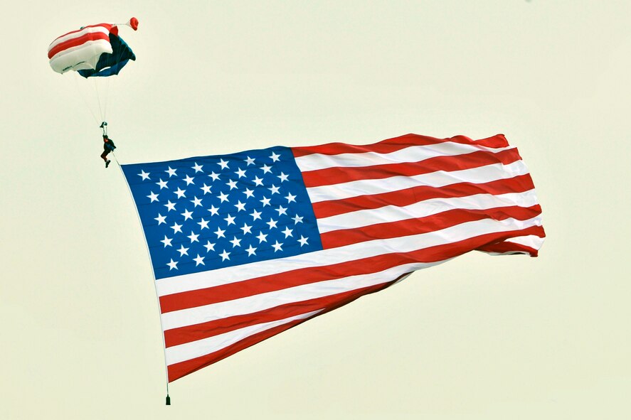 E-Team's Skydiver performs for the crowd during the 2011 Joint Service Open House May 20 at Joint Base Andrews, Md. JSOH affords the public an opportunity to meet the men and women of the Armed Forces and view military equipment from the Navy, Marines, Army, Air Force, and Coast Guard up close. (U.S. Air Force photo by Senior Airman Perry Aston)