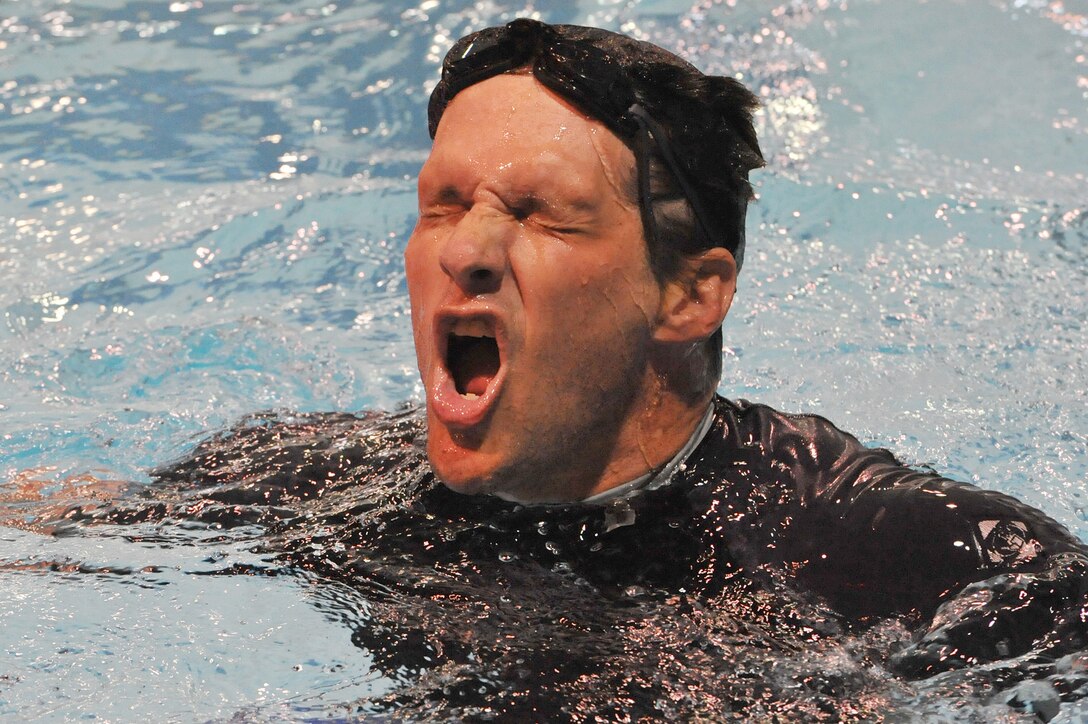 Jason M. Morgan competes in a swimming competition May 18, 2011, during the 2011 Warrior Games at the U.S. Olympic Training Center in Colorado Springs, Colo. More than 200 wounded warriors from all the military services are competing in paralympic-style athletic events May 16 through 21. (U.S. Air Force photo/Staff Sgt. Desiree N. Palacios)