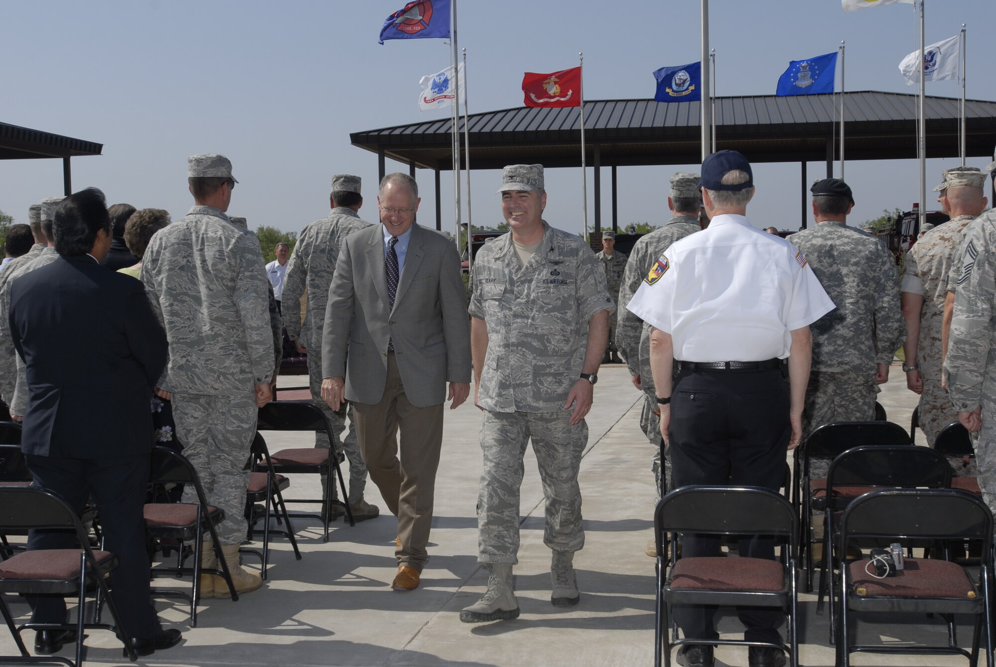 GOODFELLOW AIR FORCE BASE, Texas -- Col. Thomas Geary, 17thTraining Wing Commander, and Congressman Mike Conaway, 11th District of Texas, depart after presenting achievement medals to 54 Team Goodfellow firefighters who fought the Wildcat Fire, which burned more than 160,000 acres. (U.S. Air Force photo/Lou Czarnecki)