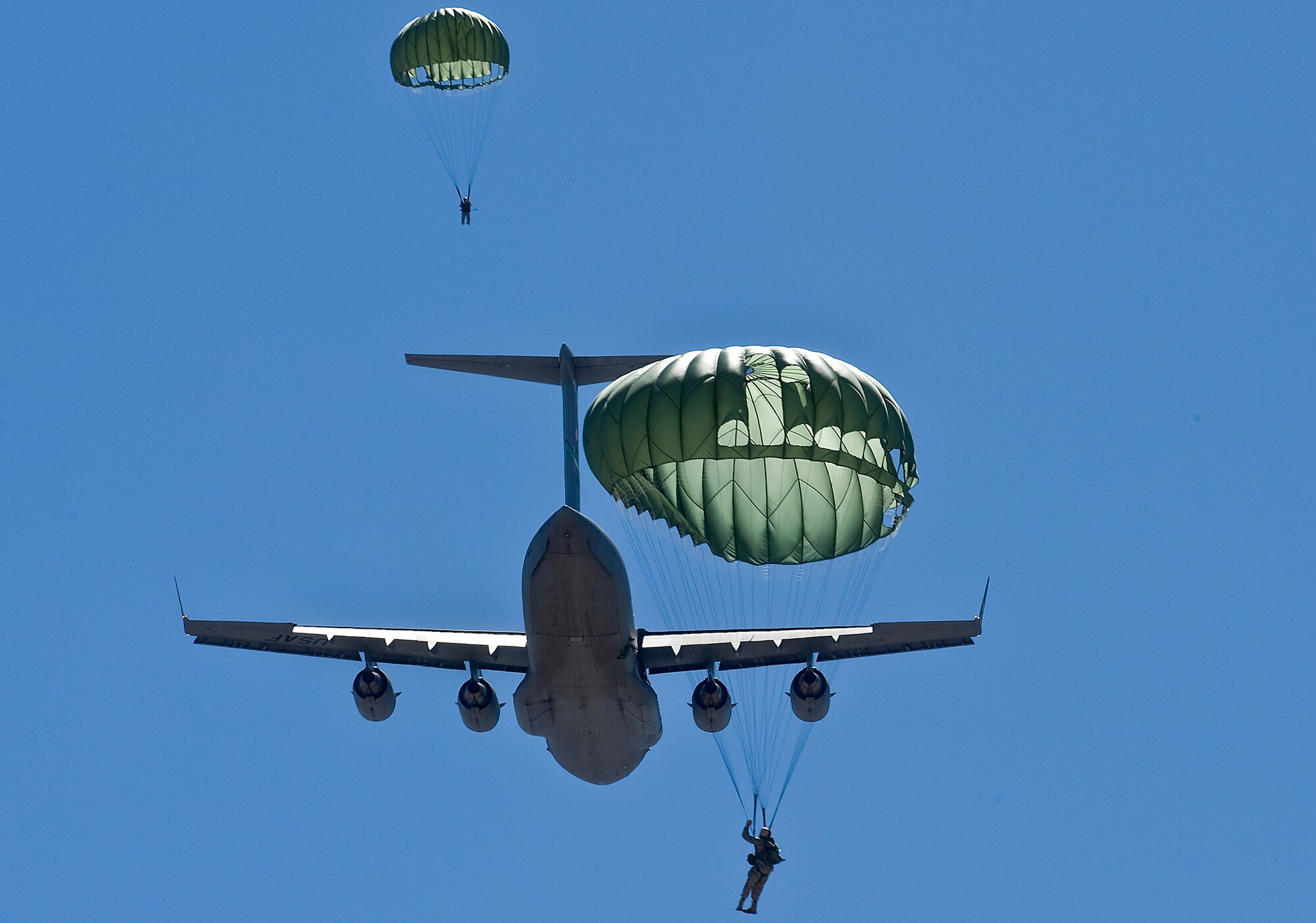 Airmen assigned to the 820th RED HORSE Squadron jump from a C-17 Globemaster III May 12, 2011, during a training exercise above Alamo, Nev. (U.S. Air Force photo /Airman 1st Class George Goslin)
