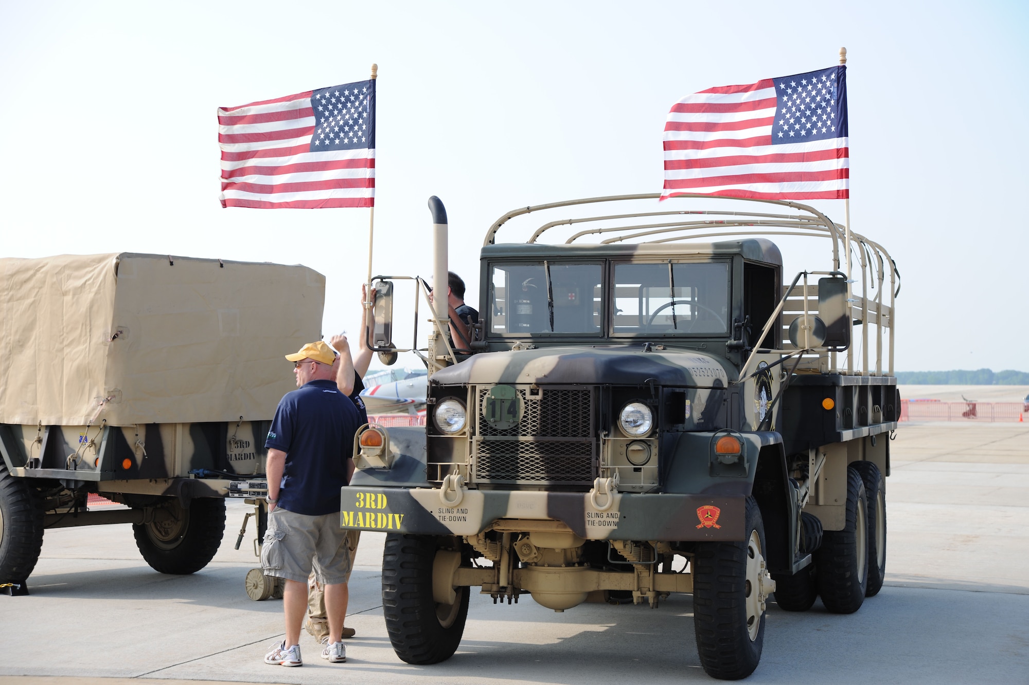 A restored 1970 Marine Corps M35A2, is prepped for transport by the Walter Reed Army Medical Center Warrior Aviation crew before transporting Wounded Warriors from hospital during a part of the 2011 Joint Service Open House May 20. The 2011 JSOH affords members of the public an excellent opportunity to meet and interact with the men and women of the armed forces and to showcase military equipment from the Navy, Marines, Army, Air Force, and Coast Guard. The 2011 JSOH is planned and conducted by active duty, guard, reserve, civilian employees, as well as retirees and family of military members. (U.S. Marine Corps photo)