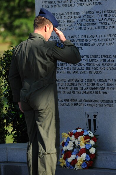 U.S. Air Force Tech. Sgt. Benjamin Joiner, 8th Special Operations Squadron flight engineer, renders a salute after presenting a memorial wreath during the Storm 73 Memorial Ceremony, Hurlburt Field, Fla., May 18, 2011. The ceremony was in honor of the members who died in the line of duty when their CV-22 crashed in Afghanistan, April 9, 2010. (U.S. Air Force photo by Airman 1st Class Caitlin O'Neil-McKeown/RELEASED)