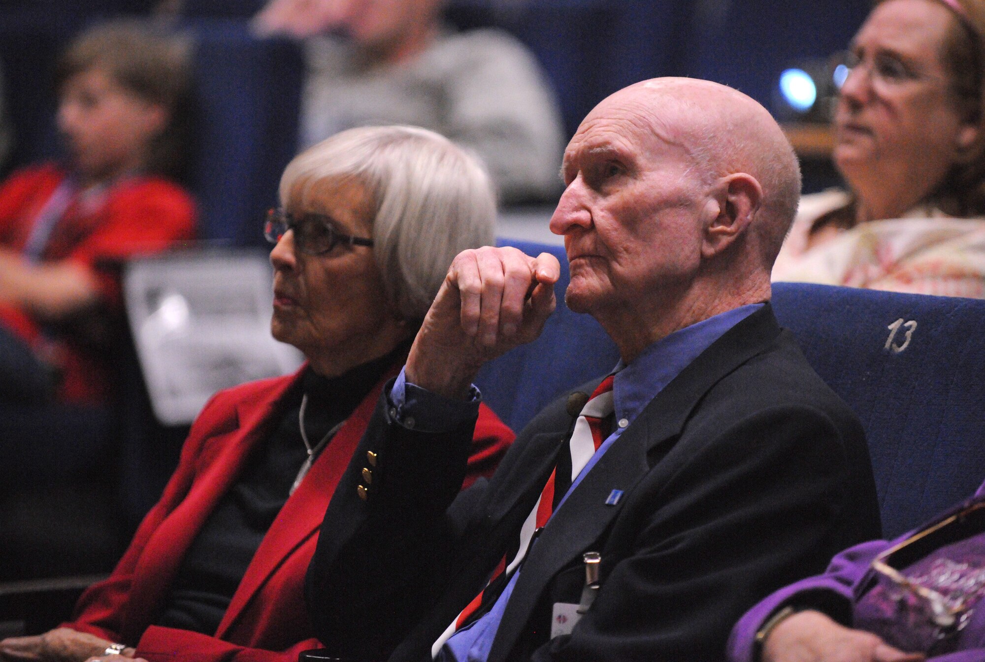 SPANGDAHLEM AIR BASE, Germany – Retired Col. Gail Halvorsen watches a video presentation before speaking to members of the 52nd Fighter Wing about the Berlin Airlift during his visit here May 18. Colonel Halvorsen dropped candy to Berlin children from 1947-1948 and earned the nickname “Candy Bomber.” (U.S. Air Force photo/Senior Airman Nathanael Callon)