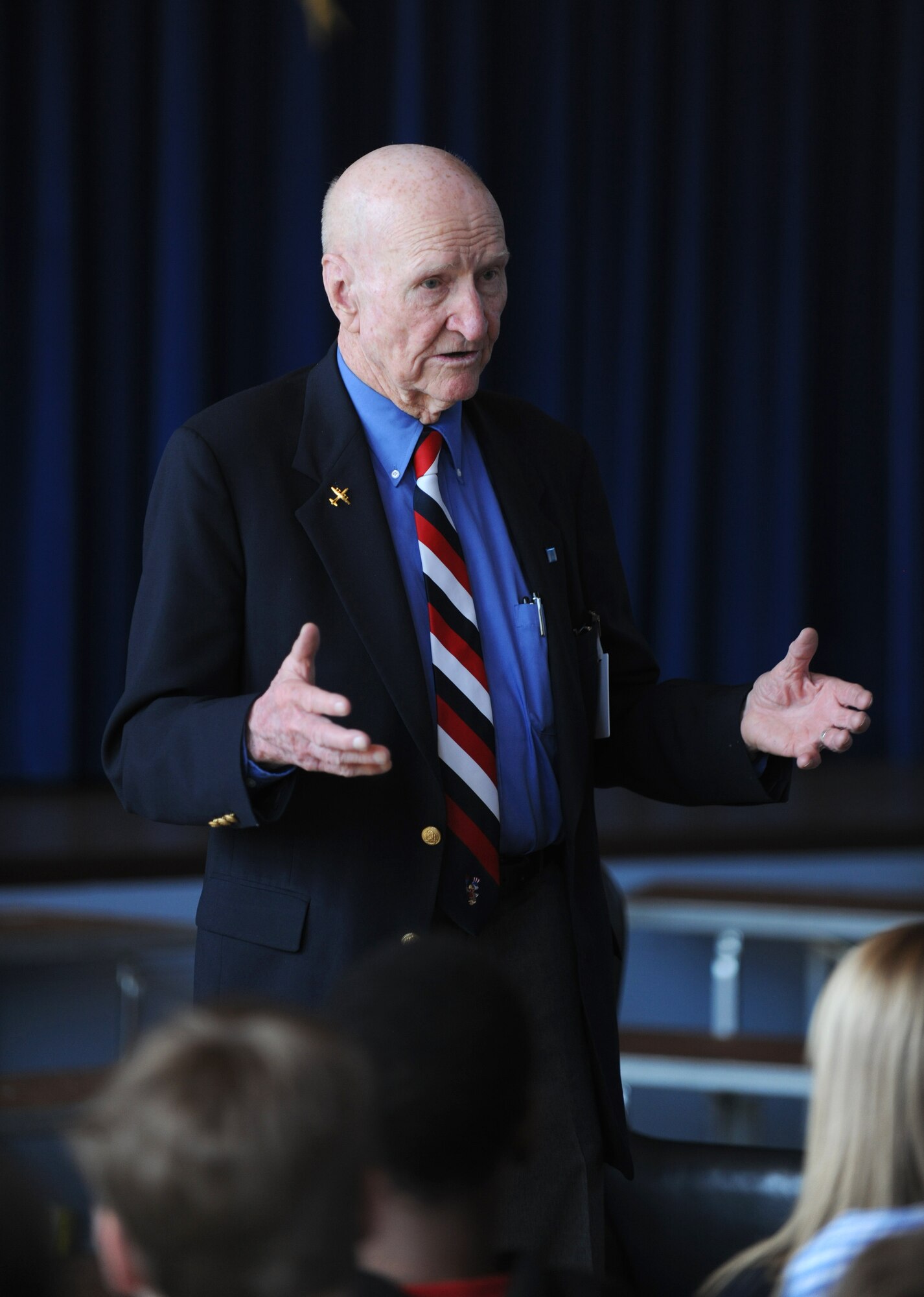 SPANGDAHLEM AIR BASE, Germany – Retired Col. Gail Halvorsen speaks to Bitburg Middle School students about the Berlin Airlift during his visit here May 18. Colonel Halvorsen dropped candy to Berlin children from 1947-1948 and earned the nickname “Candy Bomber.” (U.S. Air Force photo/Senior Airman Nathanael Callon)