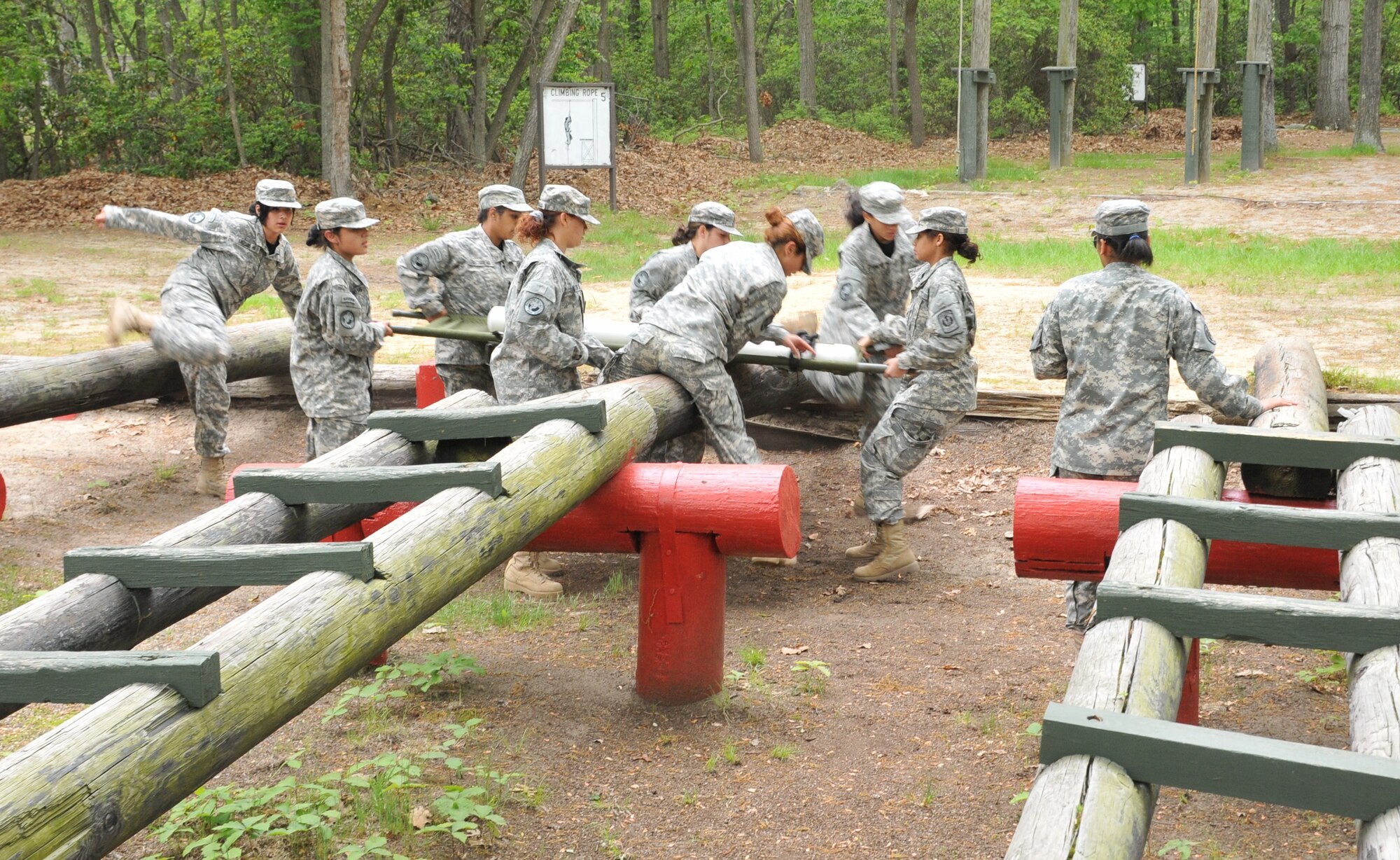 Female Junior Reserve Officer Training Corps cadets from Eastside High School, transport a simulated casualty through an obstacle course as part of the first aid/litter carry event of the 2011 JROTC Raider competition held here May 14. The winners of the 2011 JROTC Raider competition All-male and All-female teams were Francis Lewis High School and the Mixed-team winners were the cadets from Beaver High School out of Beaver, Pa. (U.S. Air Force photo by Pascual Flores/Released)