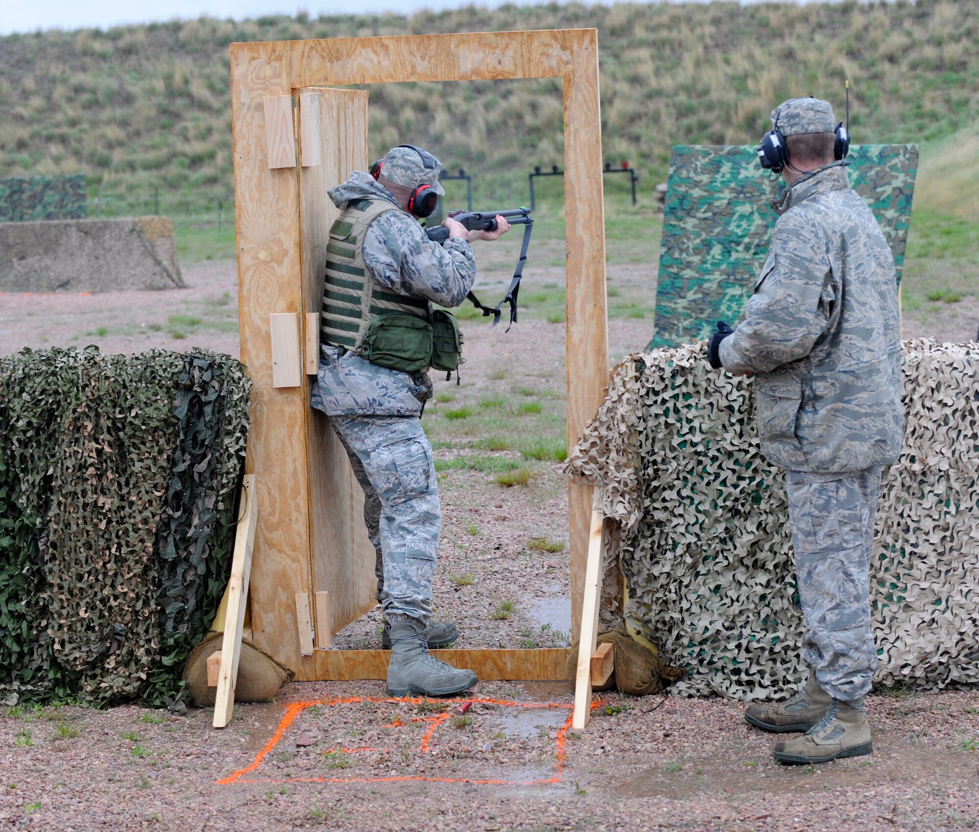 Col. James Katrenak, 28th Maintenance Group commander, engages targets during the shotgun portion of the “O-6 Shootout” at Ellsworth Air Force Base, S.D., May19, 2011. The competition promoted camaraderie between military and local law enforcement agencies, and was one of a variety of events which took place during National Police Week. (U.S. Air Force photo/ Senior Airman Adam Grant)