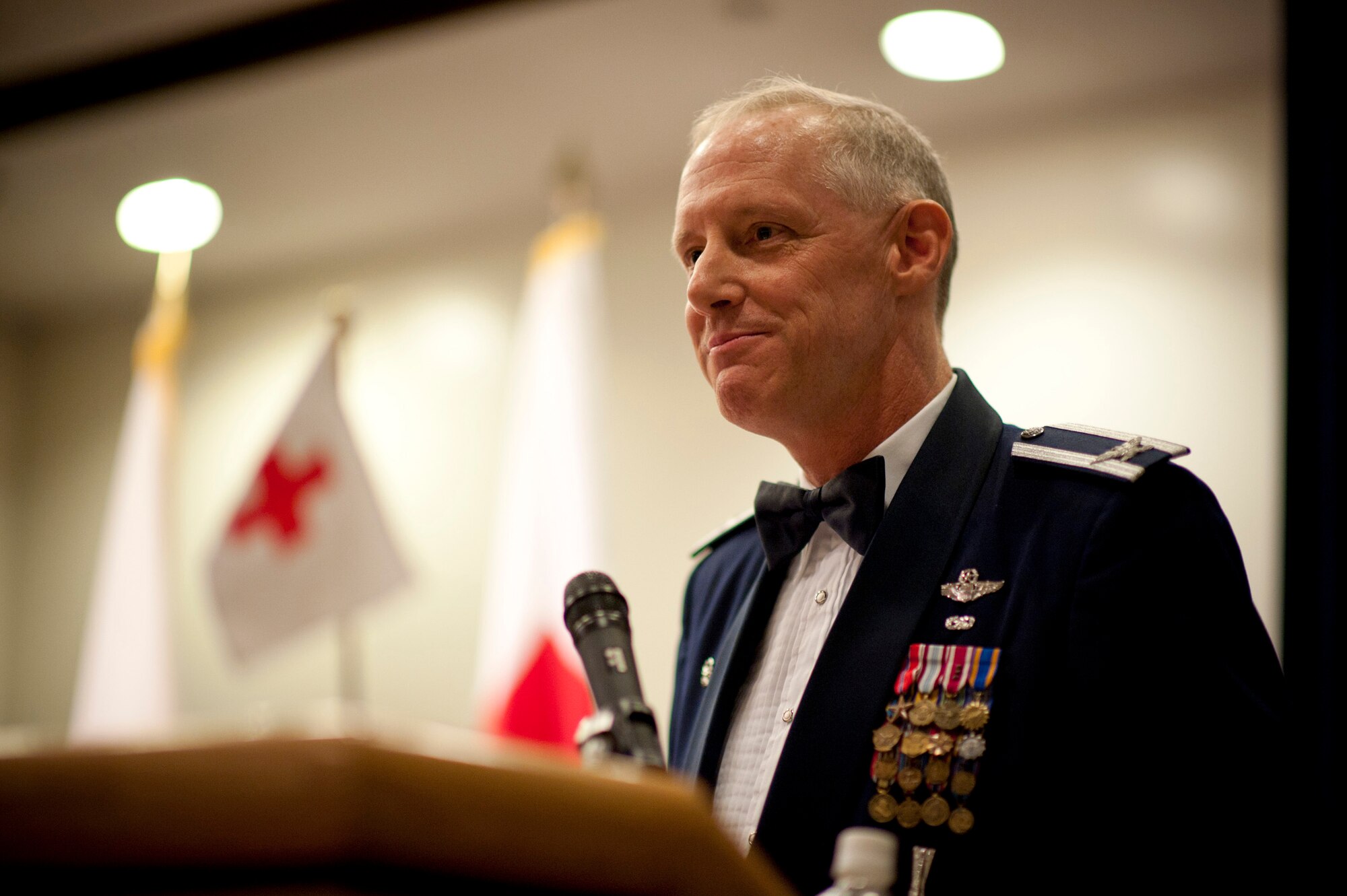 YOKOTA AIR BASE, Japan -- Col. Otto Feather, 374th Airlift Wing commander, delivers a speech at the Red Cross Appreciation Dinner at Yokota Air Base, Japan, May 18, 2011. Colonel Feather commented on the heavy workload accomplished by the Red Cross volunteers during the previous summer's flooding and more recently during Operation Tomodachi helping to rebuild after the March earthquake and tsunami. (U.S. Air Force photo/Staff Sgt. Samuel Morse)