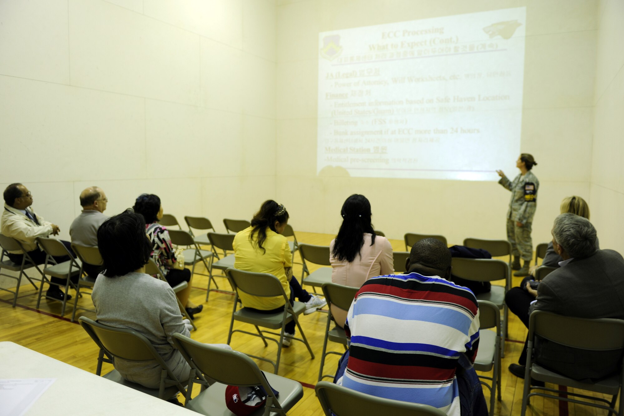 KUNSAN AIR BASE, Republic of Korea -- Noncombatants are briefed on expectations and procedures during Exercise Courageous Channel here May 19. Participation in the NEO exercise was mandatory for all Department of Defense affiliated, command and non-command sponsored noncombatants to include all non-emergency essential U.S. civilian personnel employed by the DoD. (U.S. Air Force photo/Senior Airman Ciara Wymbs)