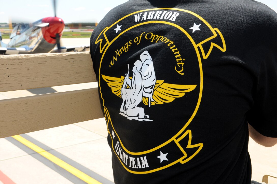 JOINT BASE ANDREWS, Md. -- The Wounded Warrior Flight Team was represented by a booth and aerial demonstrations during the Joint Service Open House here May 21-22, 2011. The WWFT is a charitable organization that helps wounded veterans obtain vocational training and eventually earn full time employment. The WWFT travels to military events like the JSOH in order to spread awareness and gain support for it's Wounded Warroir job training programs. (U.S. Air Force photo/Tech Sgt.Steve Lewis)