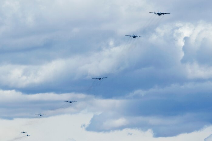 A formation of  U.S. Air Force C-130 Hercules aircraft approach Nellis Air Force Base, Nev. after completing a Mobility Forces Exercise mission May 18.  Approximately 40 C-17 Globemaster III and C-130 aircraft assembled in aerial formations over the Nevada Test and Training Range to conduct air and ground operations as part of the bi-annual U.S. Air Force Weapons School training event. (U.S. Air Force photo/Senior Airman Brett Clashman)
