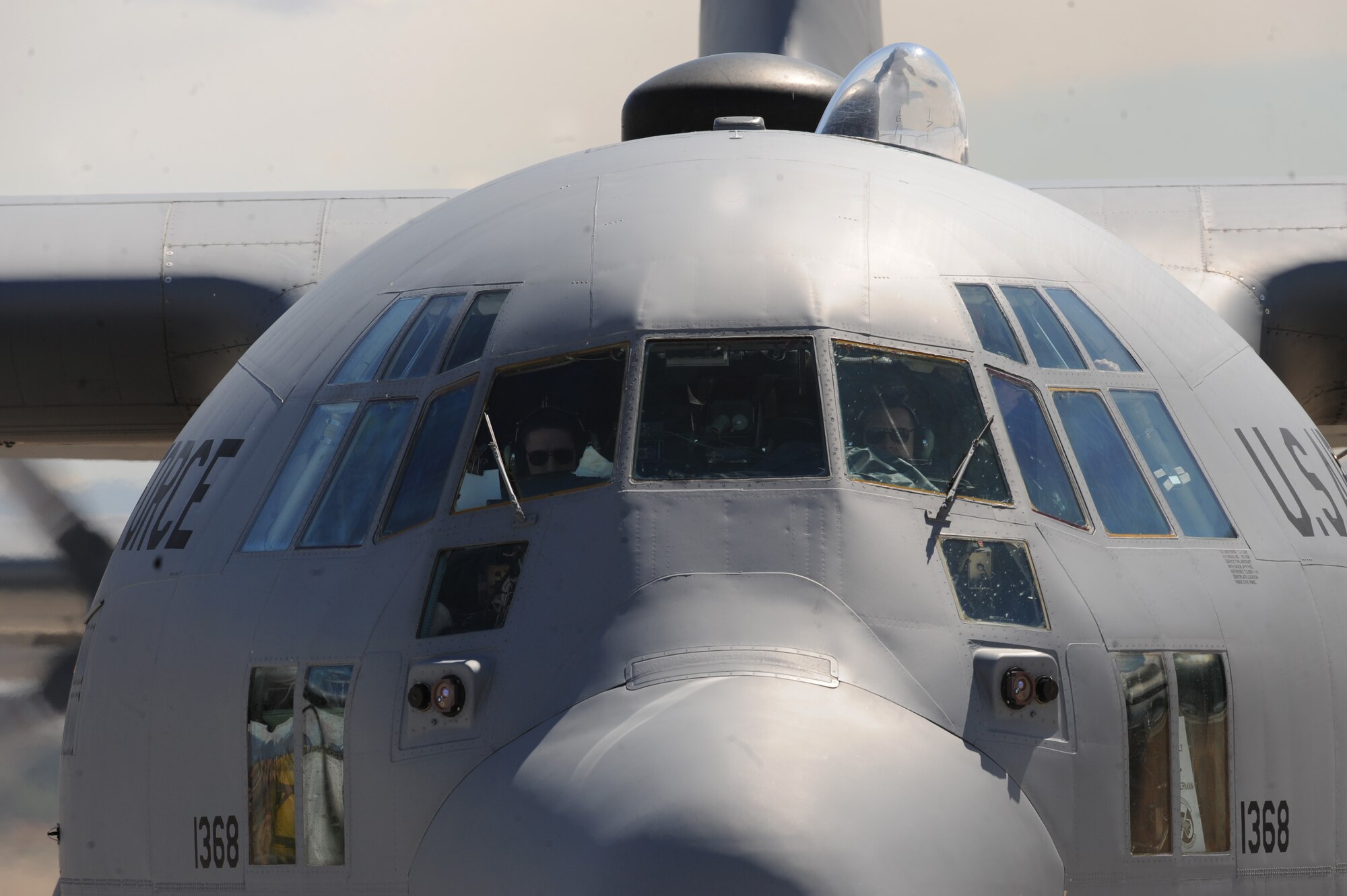 A U.S. Air Force C-130 Hercules aircraft taxis at Nellis Air Force Base, Nev. May 18, following a Mobility Air Forces Exercise.  More than 40 C-17 Globemaster III and C-130 Hercules cargo aircraft assembled in aerial formations over the Nevada Test and Training Range to conduct air and ground operations as part of the bi-annual U.S. Air Force Weapons School Mobility Air Forces Exercise.
(U.S. Air Force photo/ Master Sgt. Kevin J. Gruenwald)






